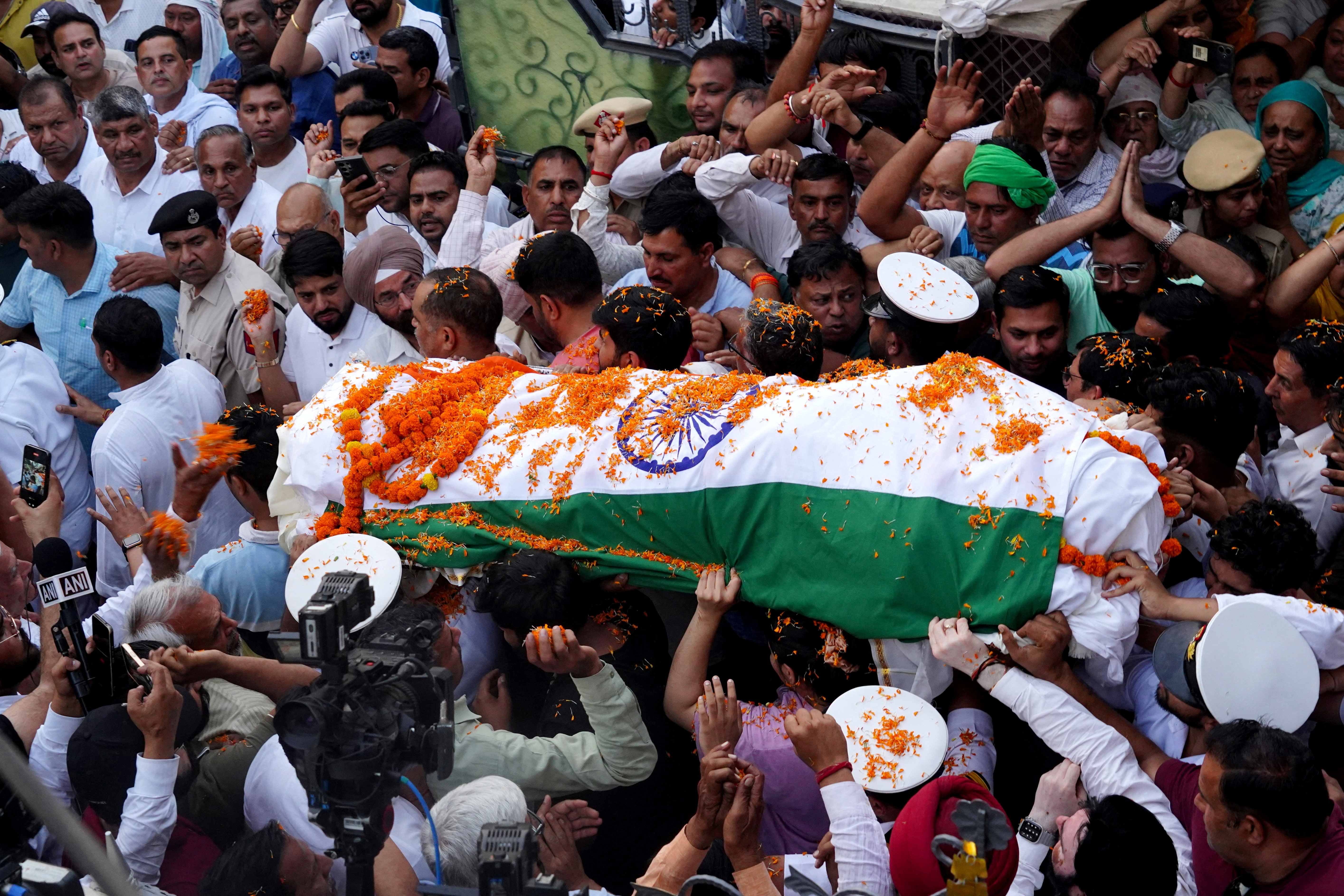 People carry the body of Vinay Narwal, a navy officer, who was killed in Tuesday’s attack near Pahalgam in south Kashmir, for his ‘last rites’ in Karnal in the northern state of Haryana, India, on April 23, 2025