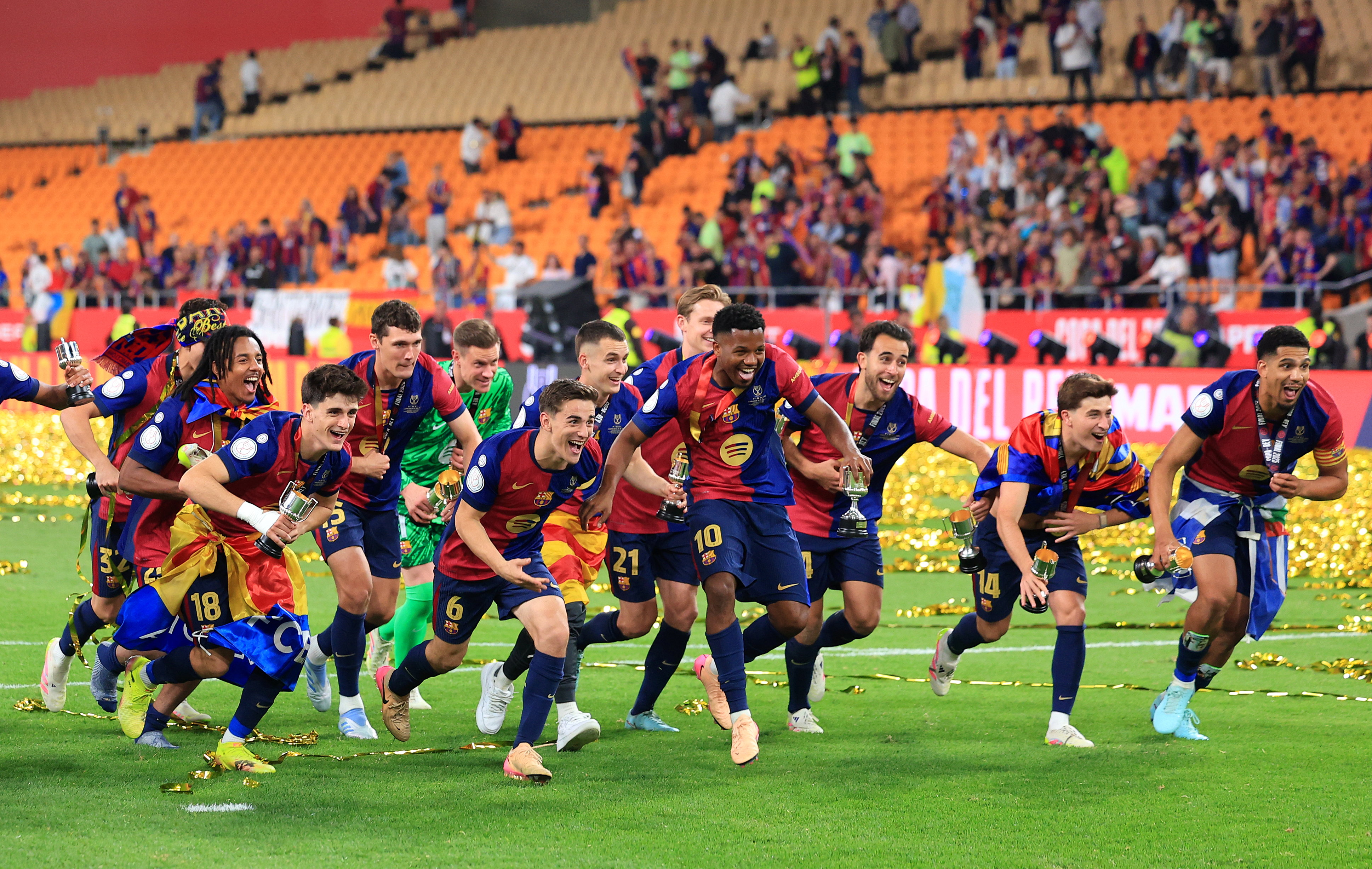 Players of FC Barcelona celebrate after the team’s victory in the Copa del Rey Final match between FC Barcelona and Real Madrid at Estadio de La Cartuja on April 26, 2025, in Seville, Spain