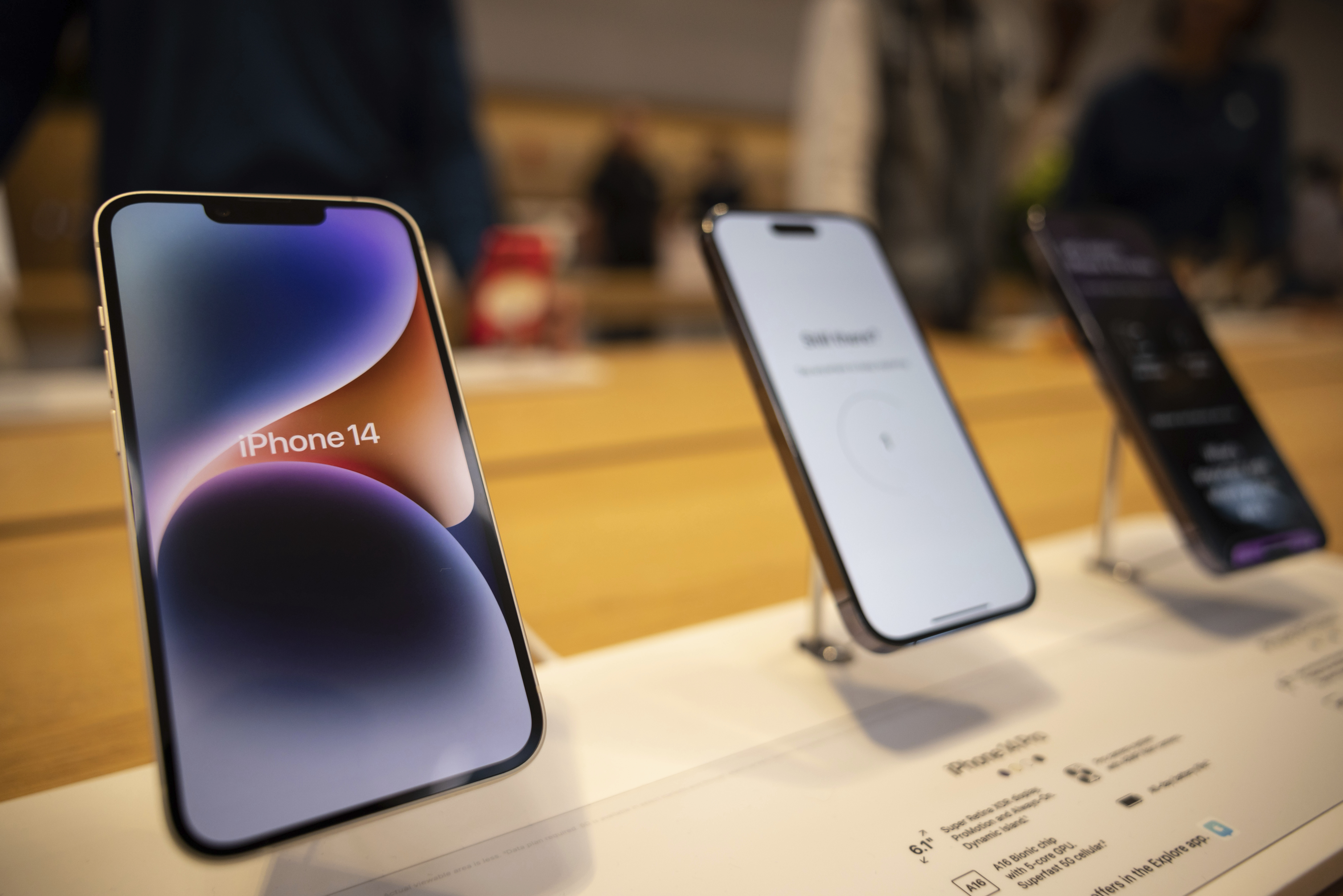 Apple iPhone smartphones are displayed at Apple’s Fifth Avenue store in New York