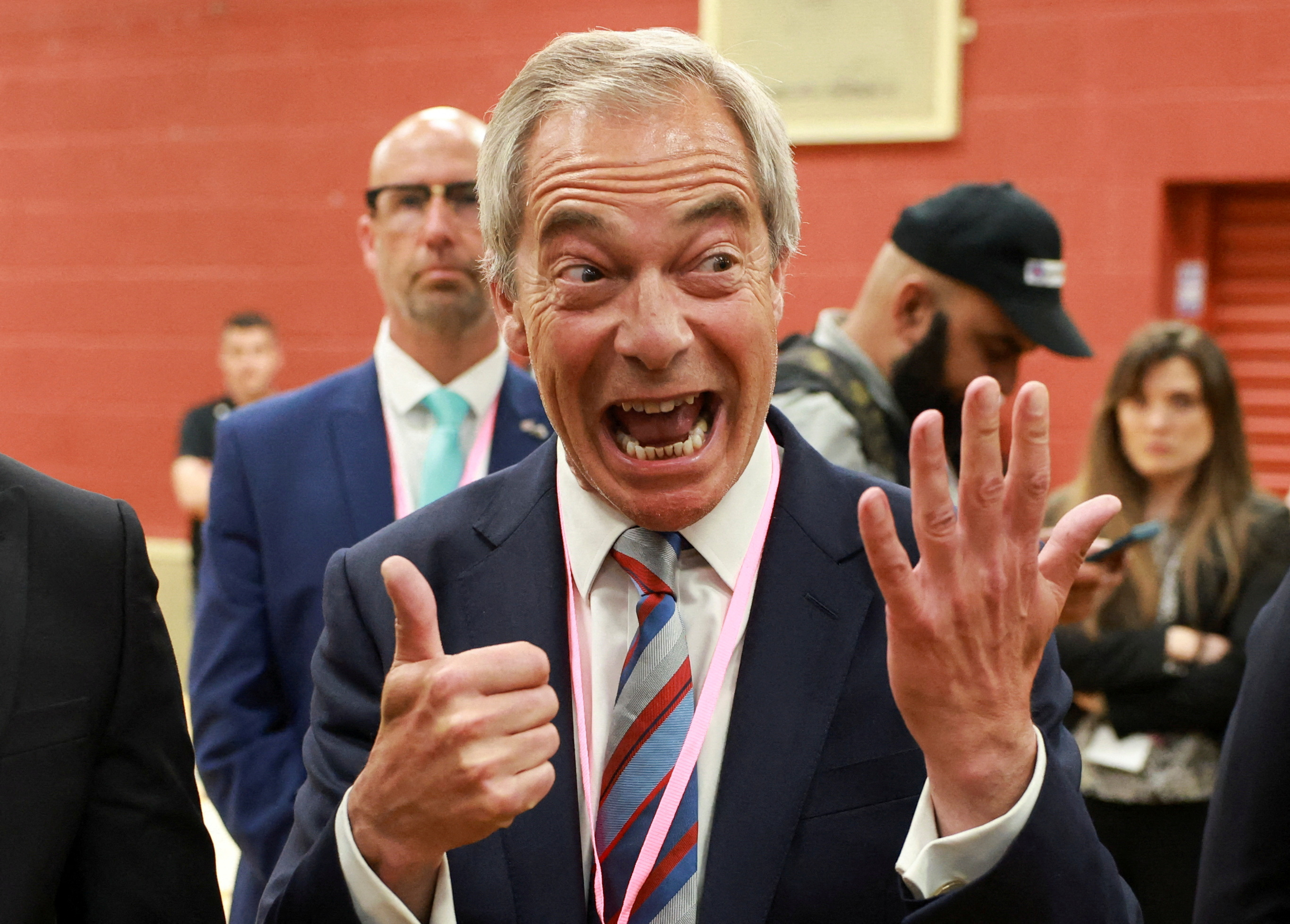 Reform party leader Nigel Farage reacts.