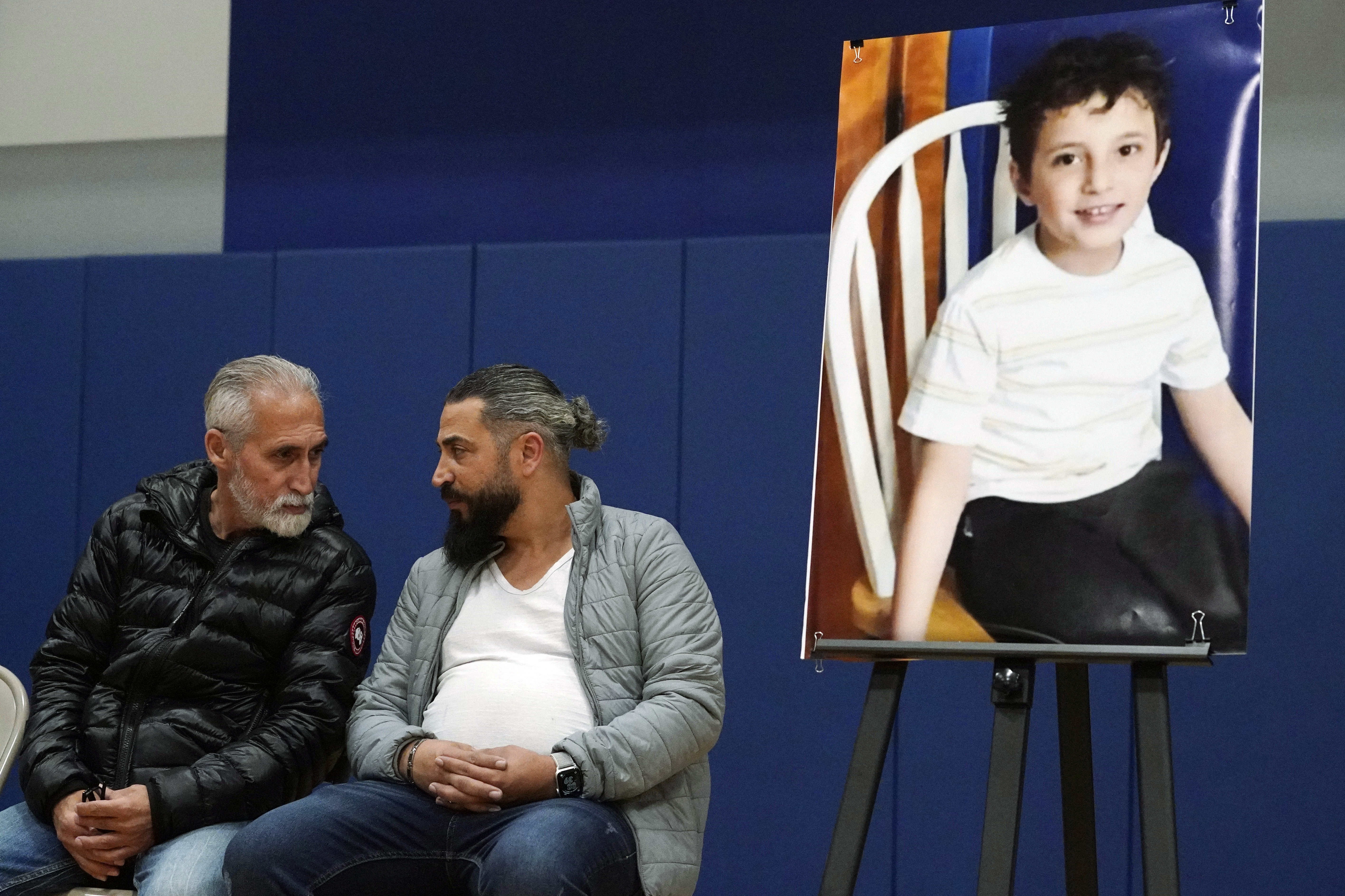Wadee Alfayoumi’s father, Oday Alfayoume, and his uncle, Mahmoud Yousef, attend a vigil on October 17, 2023