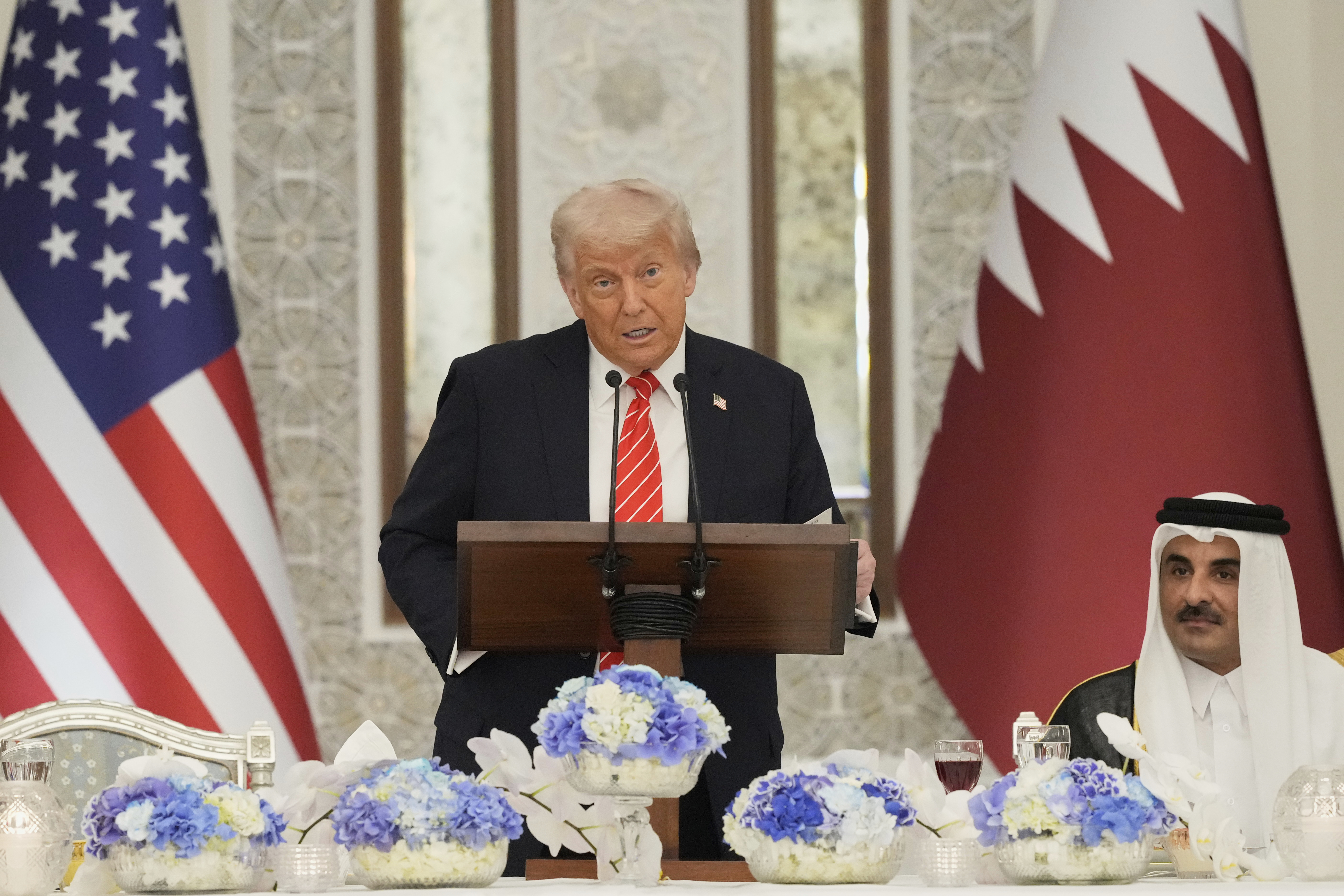 President Donald Trump speaks during a state dinner at Lusail Palace in Doha, Qatar