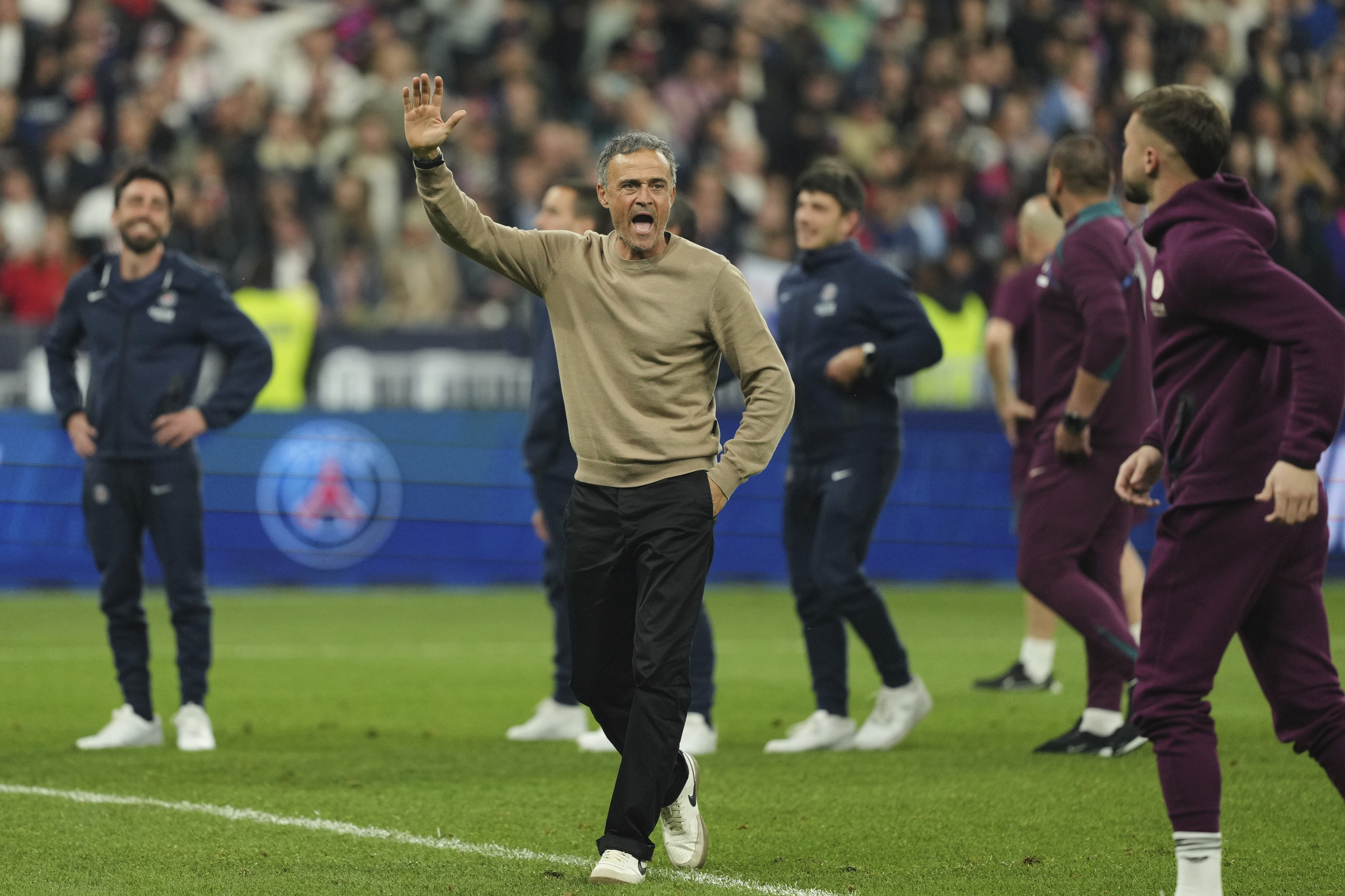 PSG’s head coach Luis Enrique, centre, celebrates at the end of the French Cup football final