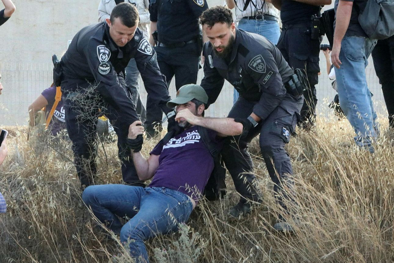 Standing Together's Alon-Lee Green is arrested while protesting near the Israeli-Gaza border [Courtesy of Standing Together]