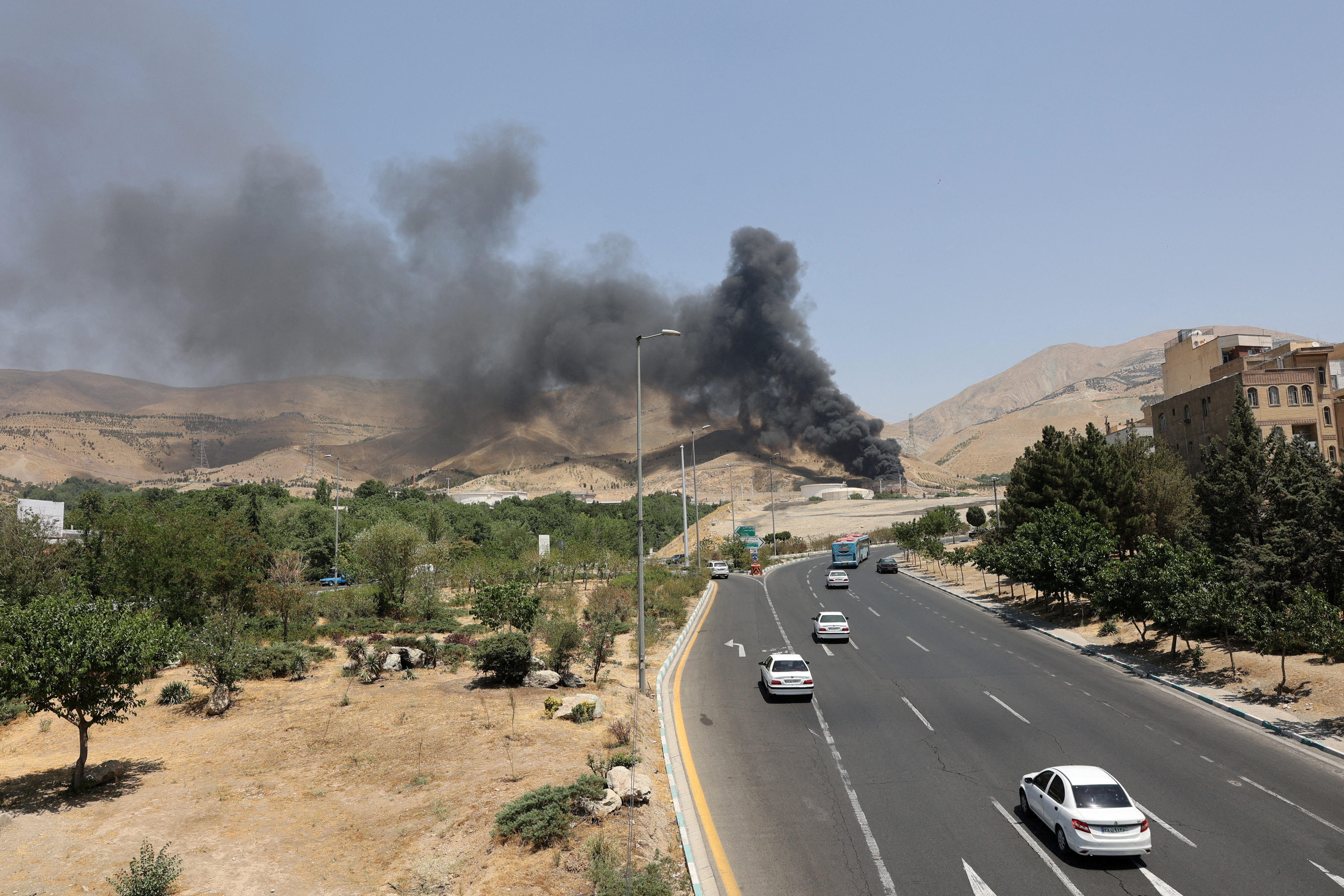 Smoke rises following what Iran says was an Israeli attack on Sharan Oil depot in Tehran, Iran, June 16, 2025. Majid Asgaripour/WANA (West Asia News Agency) via REUTERS ATTENTION EDITORS - THIS PICTURE WAS PROVIDED BY A THIRD PARTY TPX IMAGES OF THE DAY