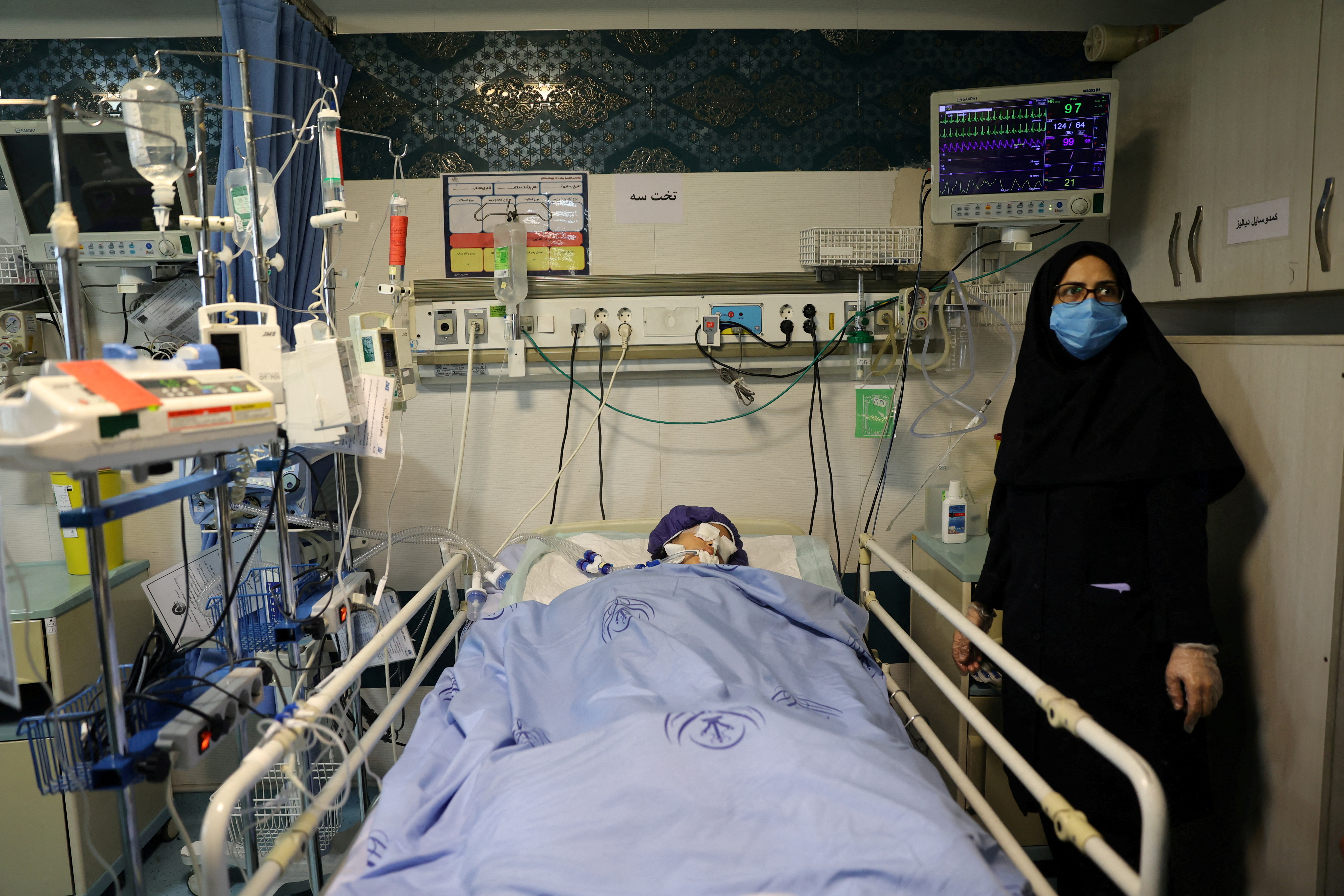 An injured girl is treated in a hospital, amid the Iran-Israel conflict, in Tehran, Iran, June 21, 2025. [Majid Asgaripour/WANA via Reuters]