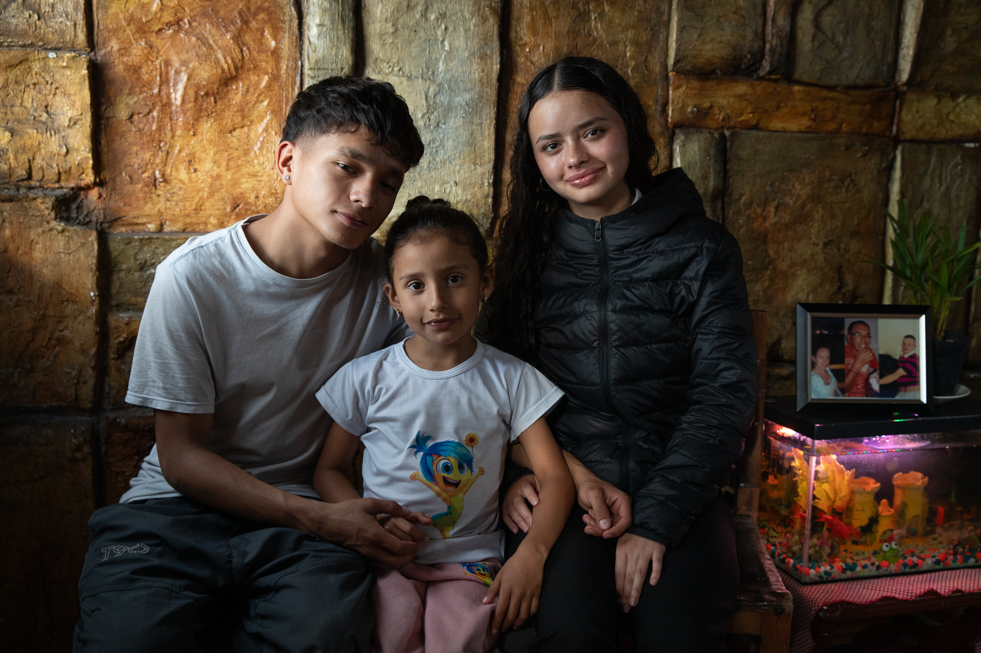 Siblings Fabian Ramirez, Luna Castro and Jennyfer Ramirez pose together for a photo