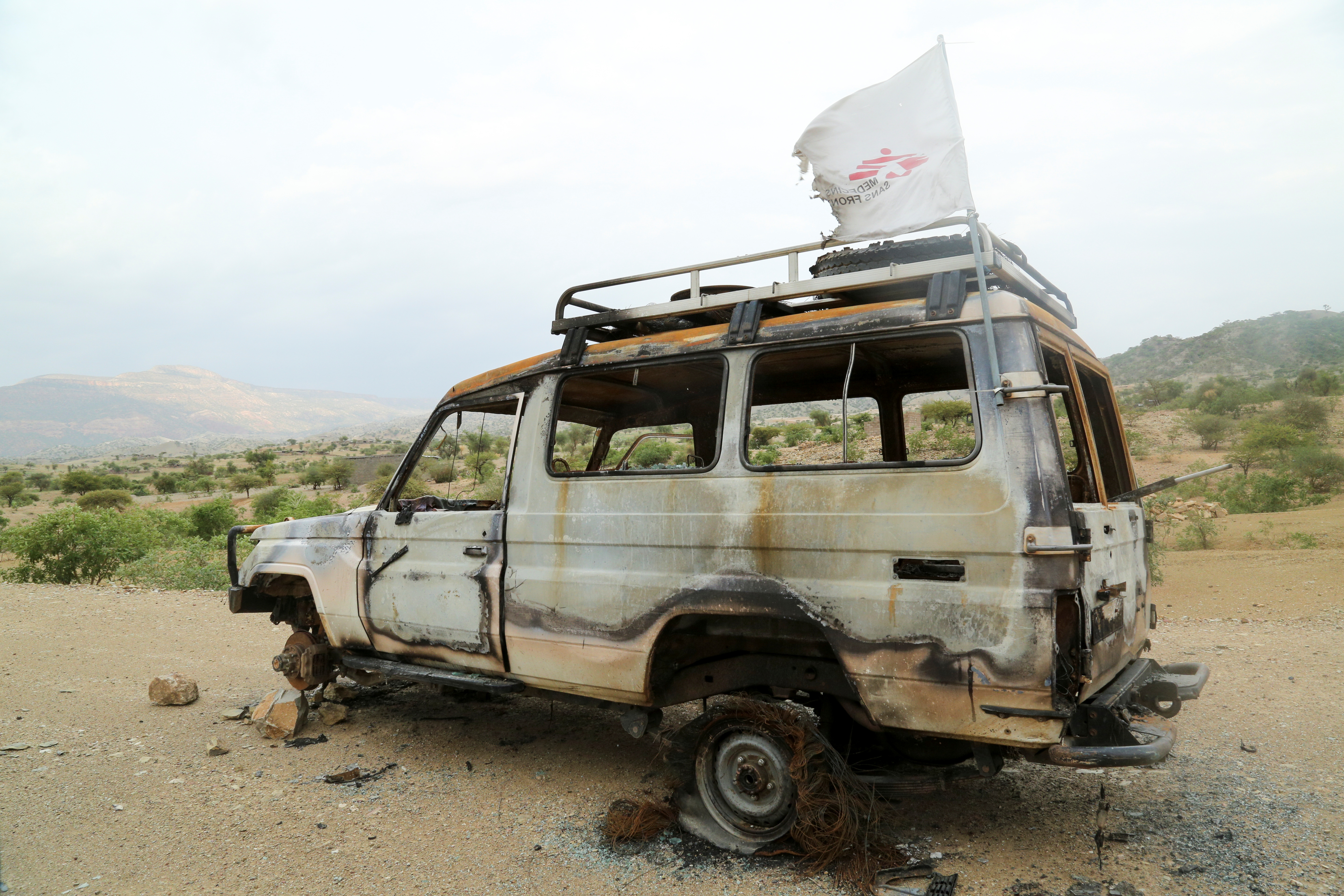 The abandoned wreckage of a vehicle used by the Spanish branch of Medecins Sans Frontieres (MSF) on the road to Sheweate Hugum in south-central Tigray, Ethiopia,