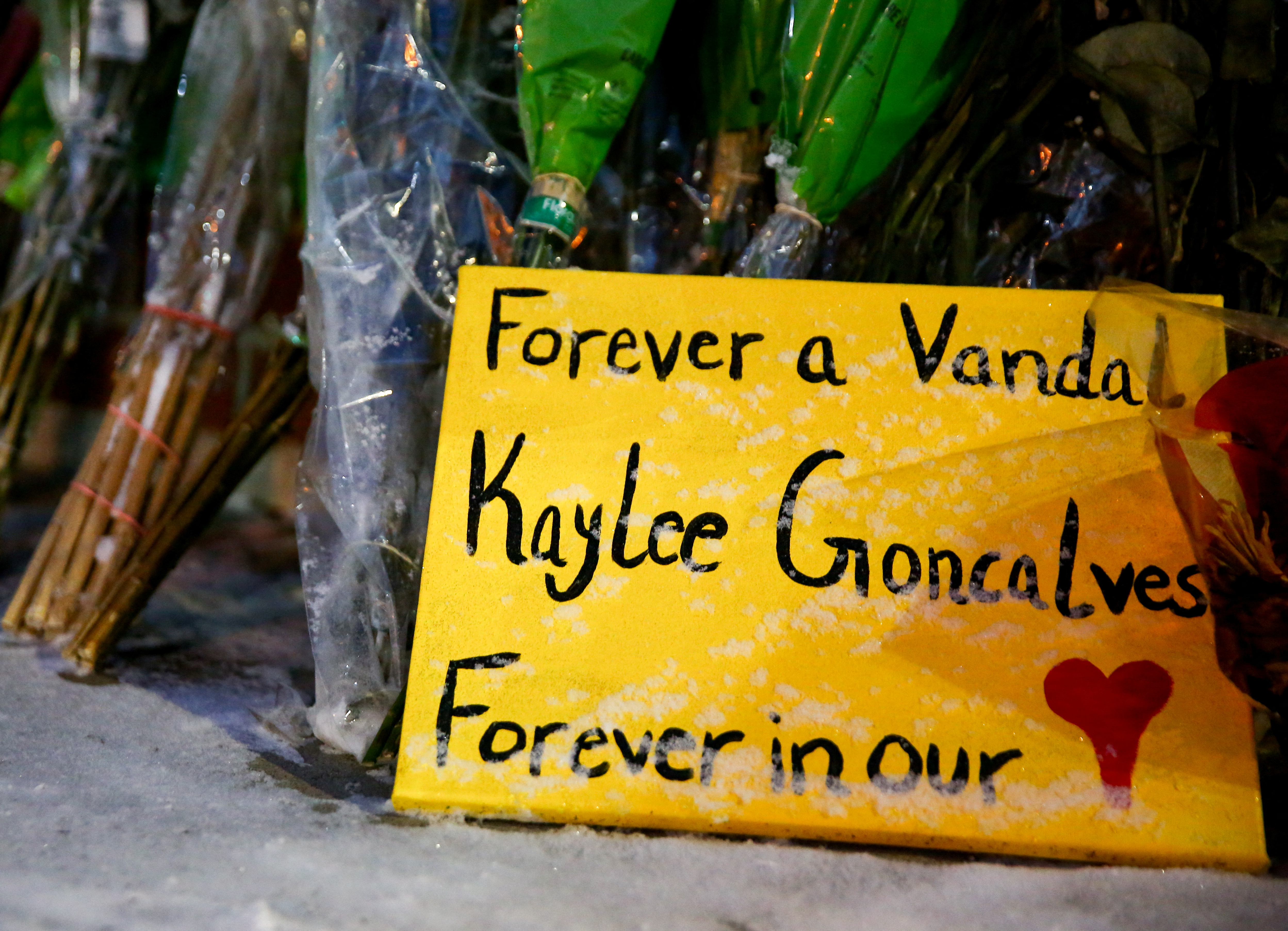 A sign memorialises Kaylee Goncalves, one of four University of Idaho students killed in their residence on November 13, 2022