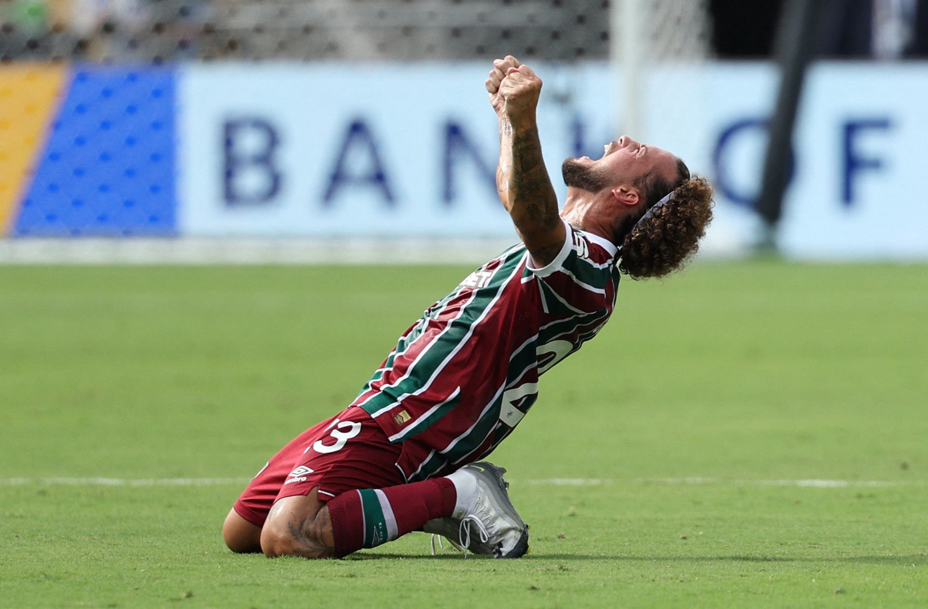 Fluminense's Guga sinks to his knees in celebration