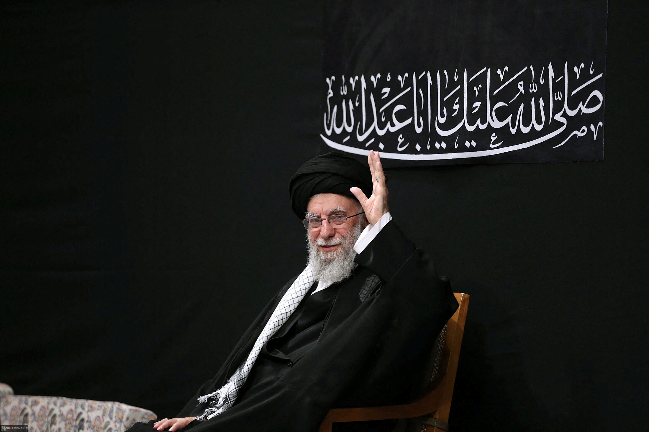 a man wearing black waves