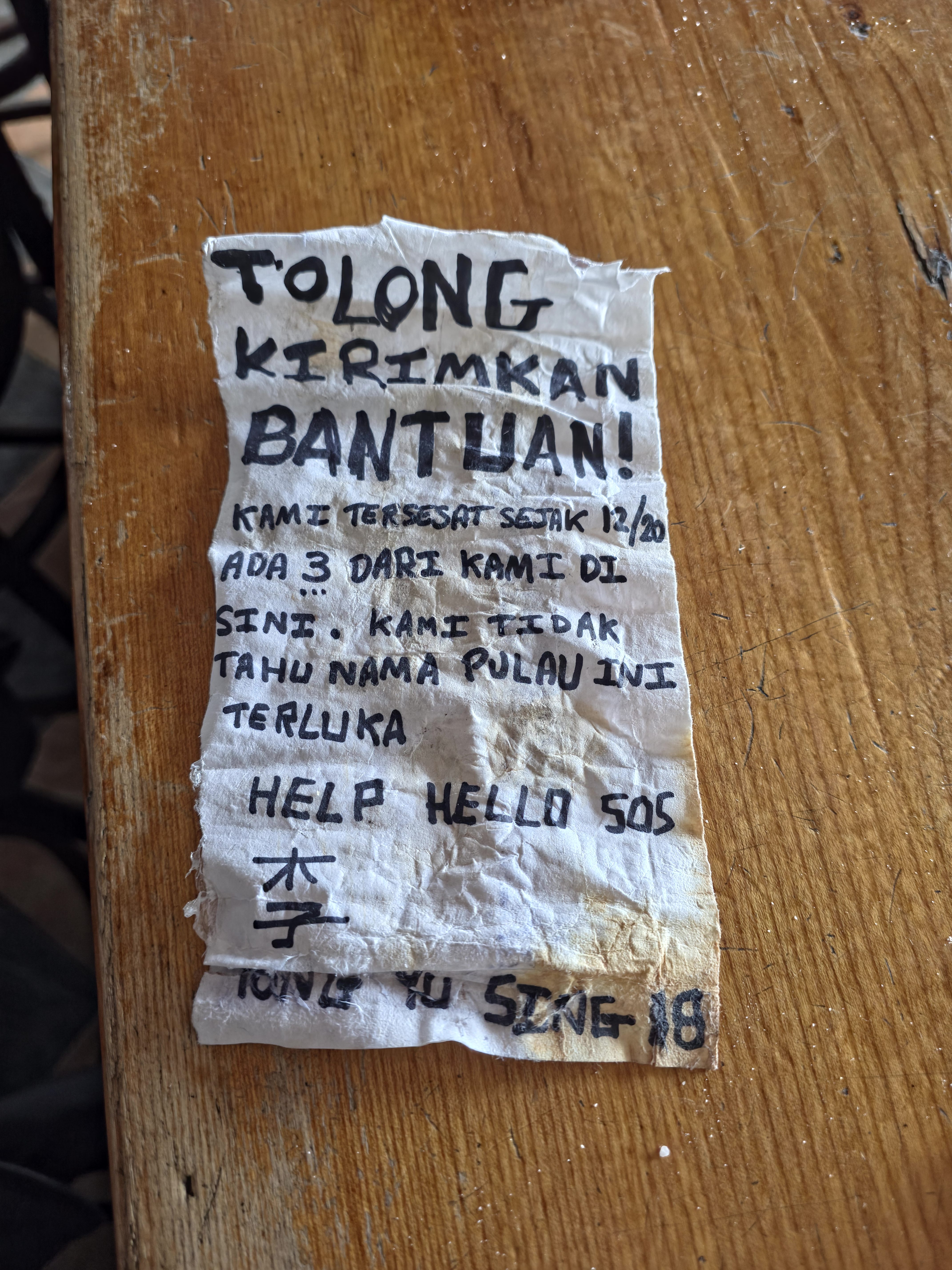 The message purporting to be from the missing crew of the Yong Yu Sing No 18 [Photo courtesy of Matthew Long]