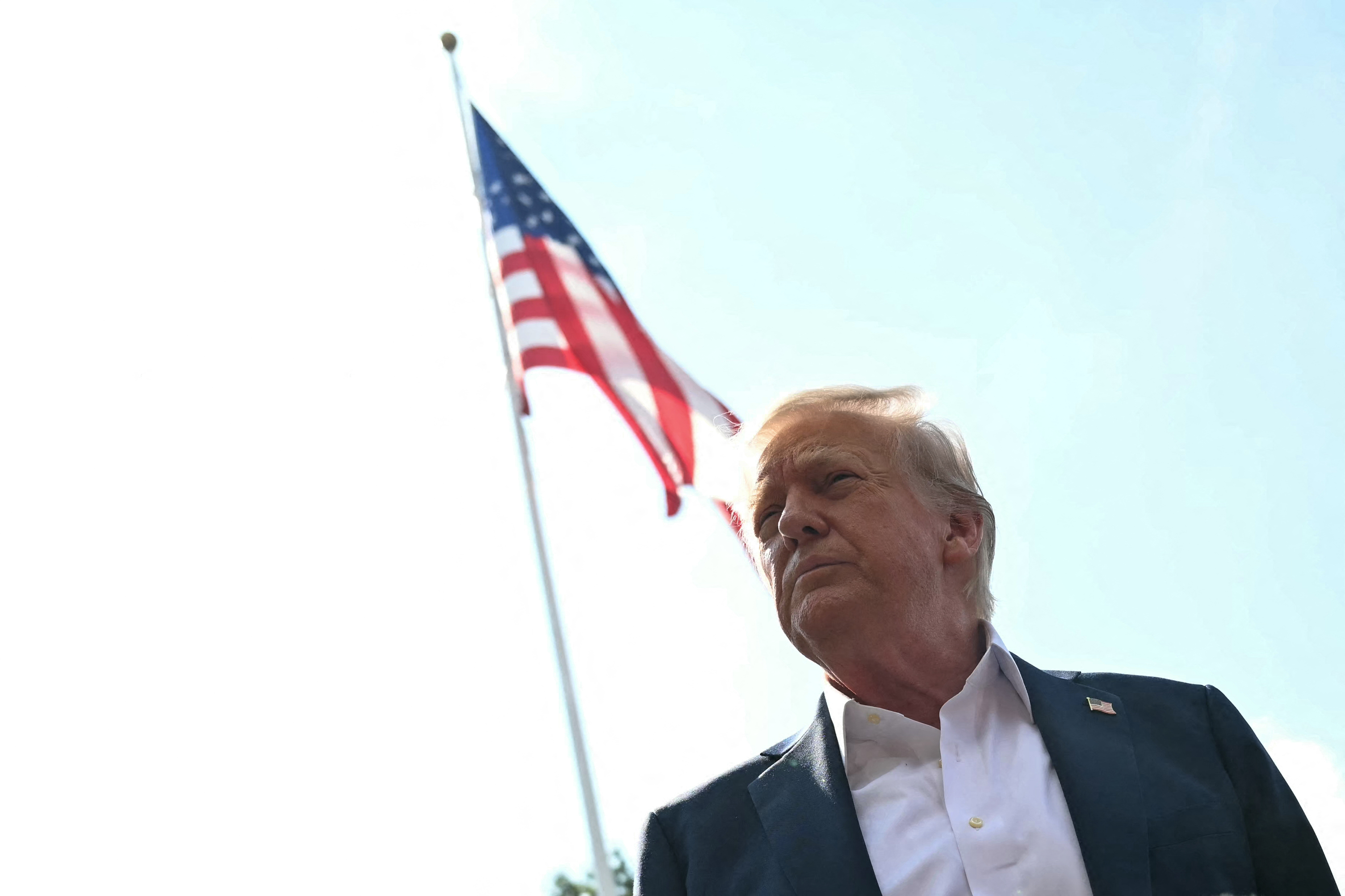 US President Donald Trump speaks to the press before boarding Marine One on the South Lawn of the White House in Washington, DC on July 11, 2025.