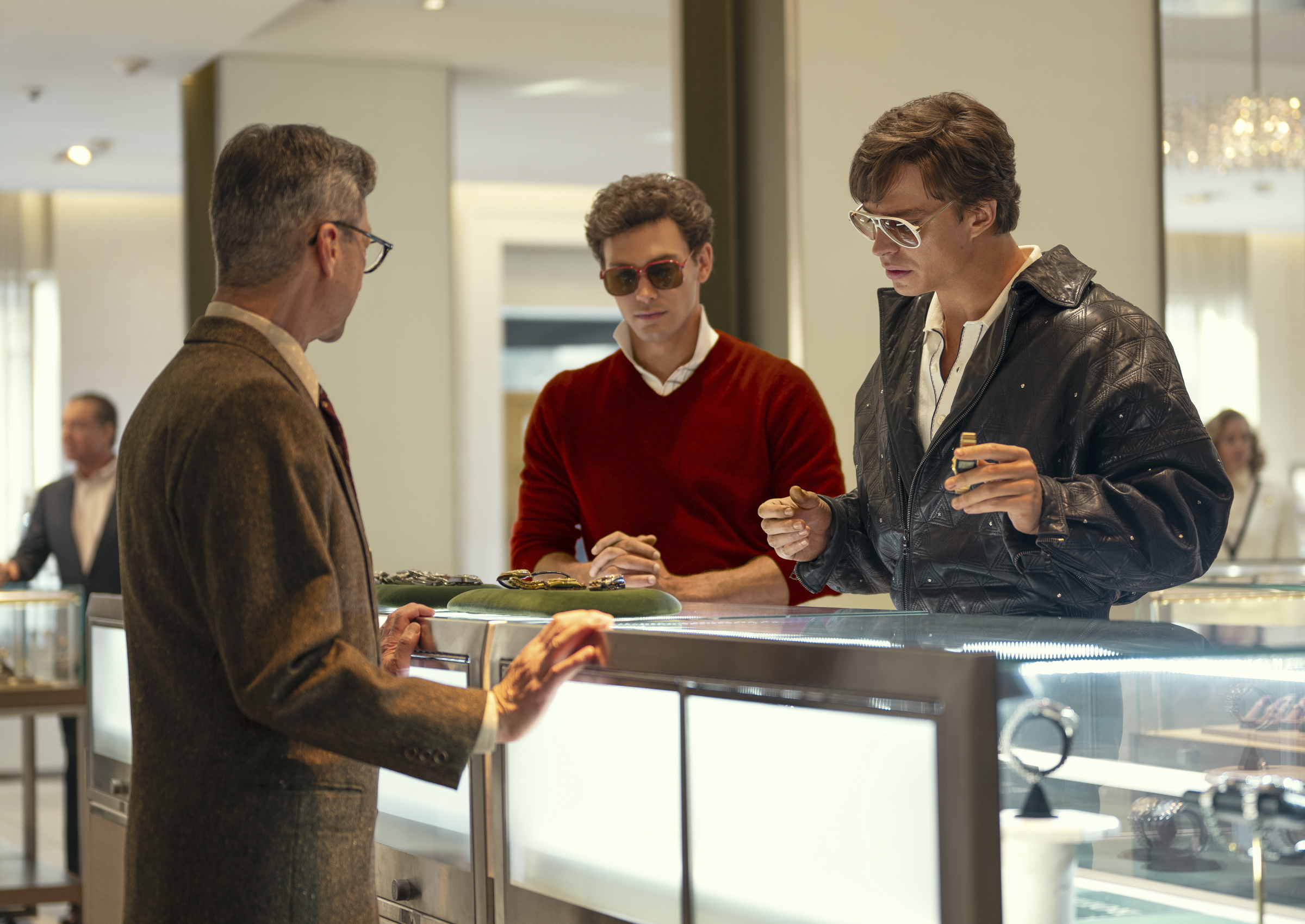 Cooper Koch as Erik Menendez, centre, and Nicholas Chavez as Lyle Menendez, right, in a scene from Monsters: The Lyle And Erik Menendez Story