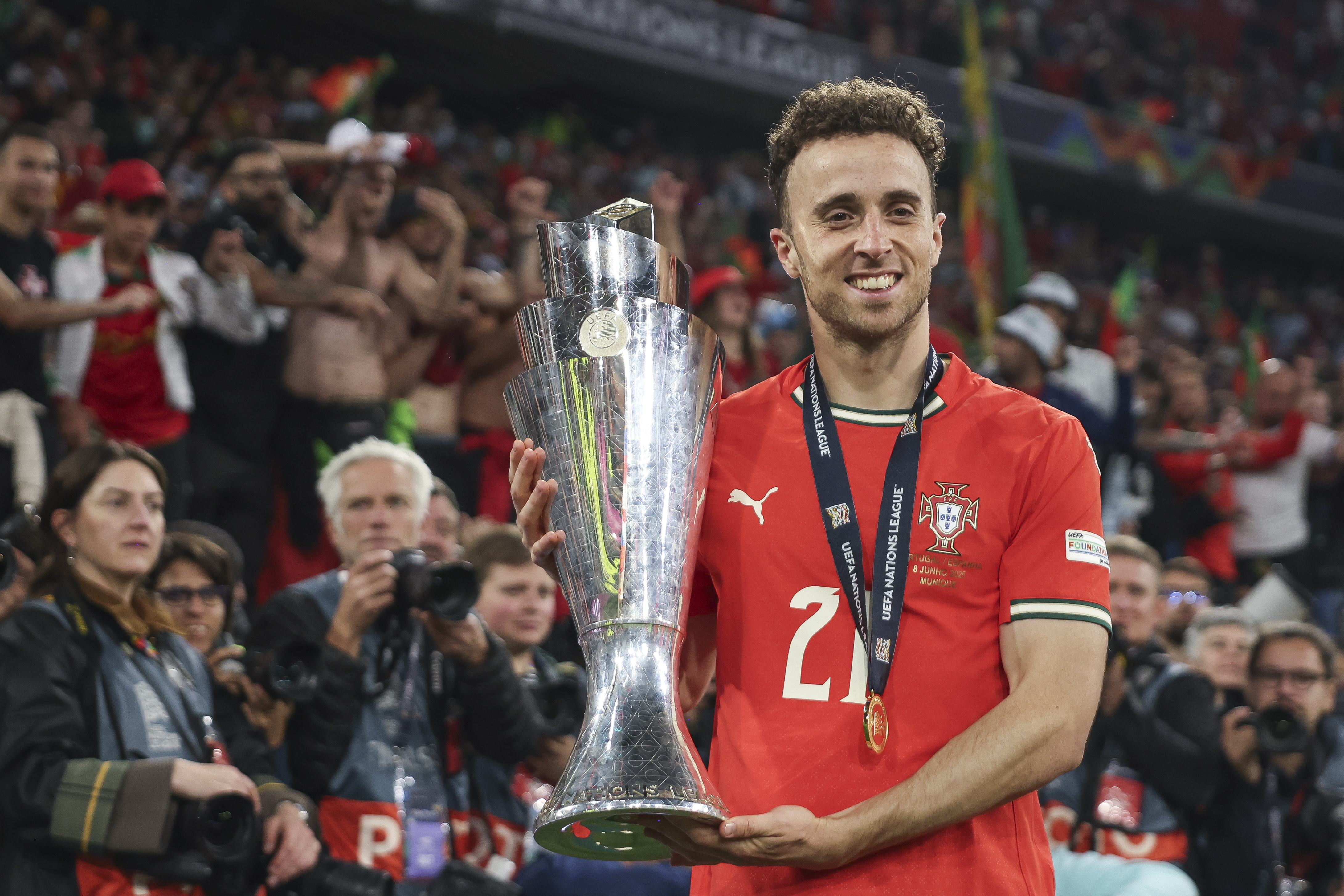 Diogo Jota of Portugal with the UEFA Nations League trophy after his team’s victory in the final between Portugal and Spain at Munich Football Arena on June 8, 2025 in Munich, Germany