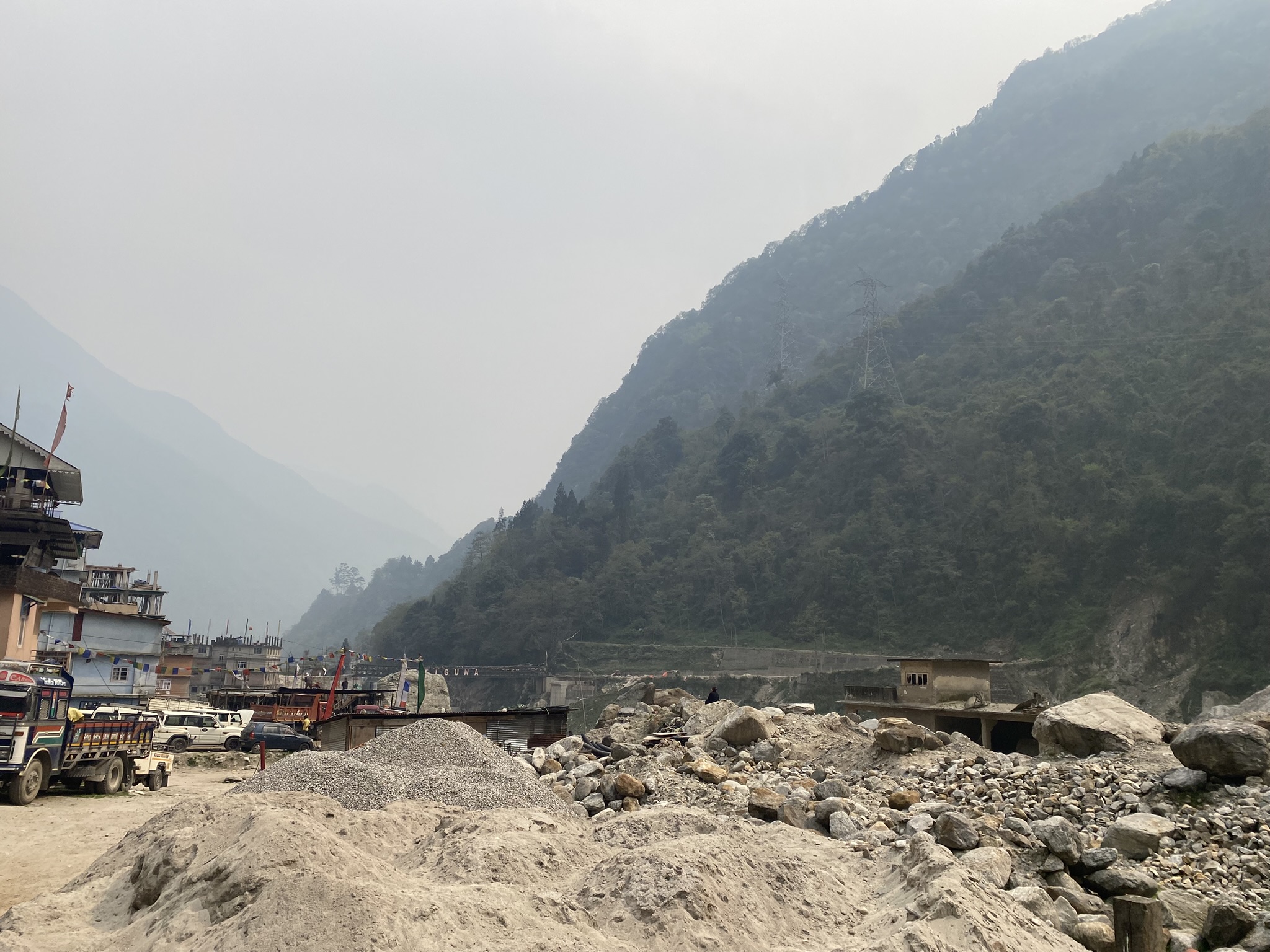 Once a thriving town, Chungthang in North Sikkim is now strewn with rocks, boulders and a deep layer of sand and debris after the 1,200-megawatt Teesta III dam was destroyed by a massive glacial lake outburst flood from South Lhonak Lake, above, in Lachen