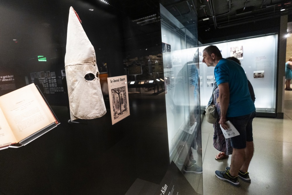 Visitors browse exhibits at the National Museum of African American History and Culture in Washington, DC, on April 29, 2025