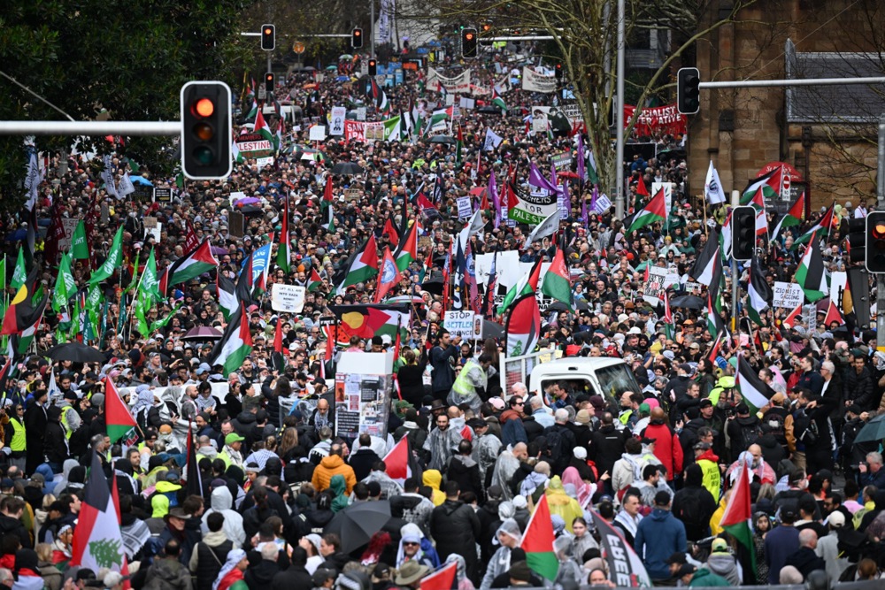 Protesters march during the Palestine Action Group's March for Humanity in Sydney, Australia on August 3, 2025.