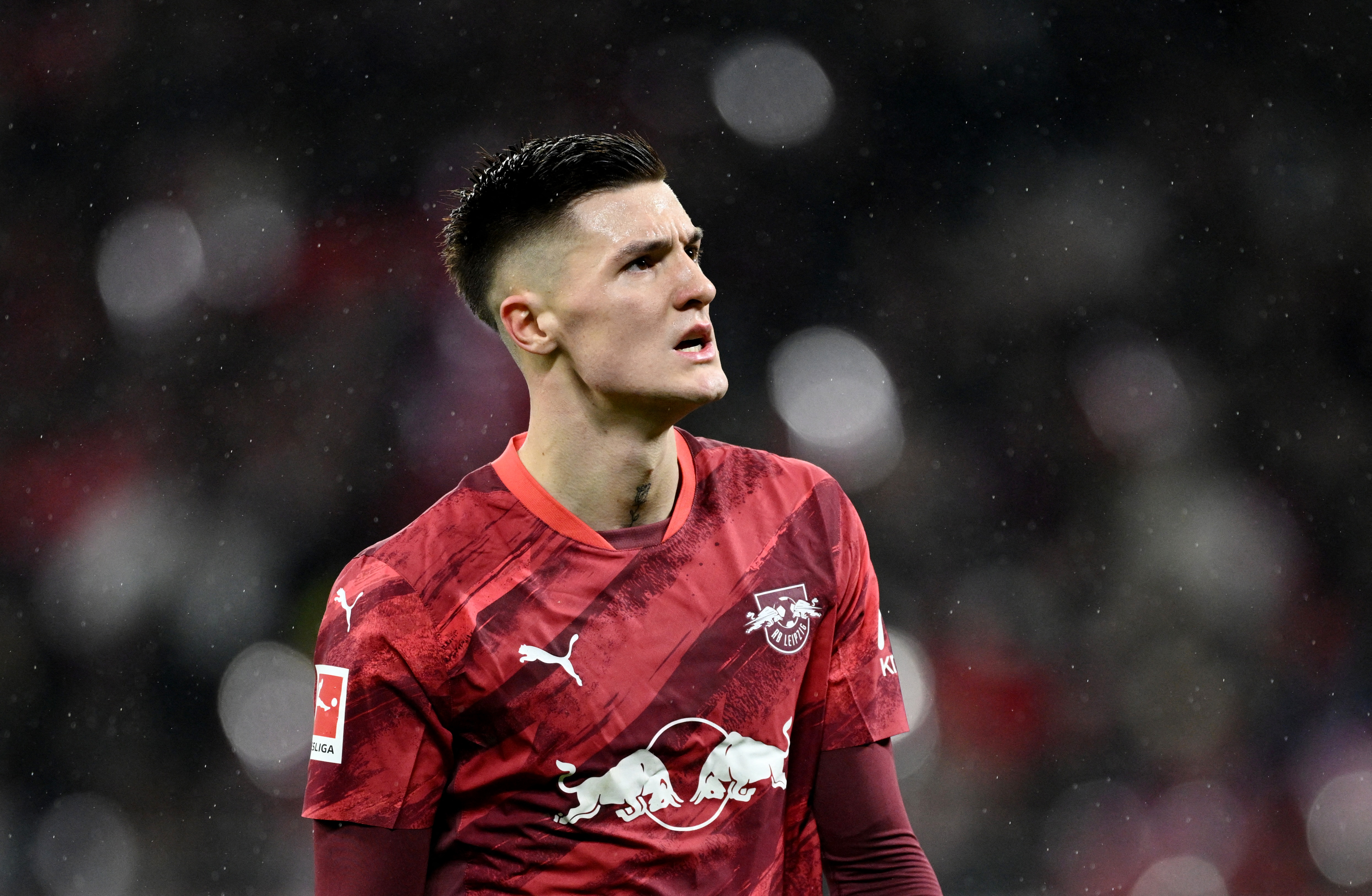 Leipzig's Benjamin Sesko looks on