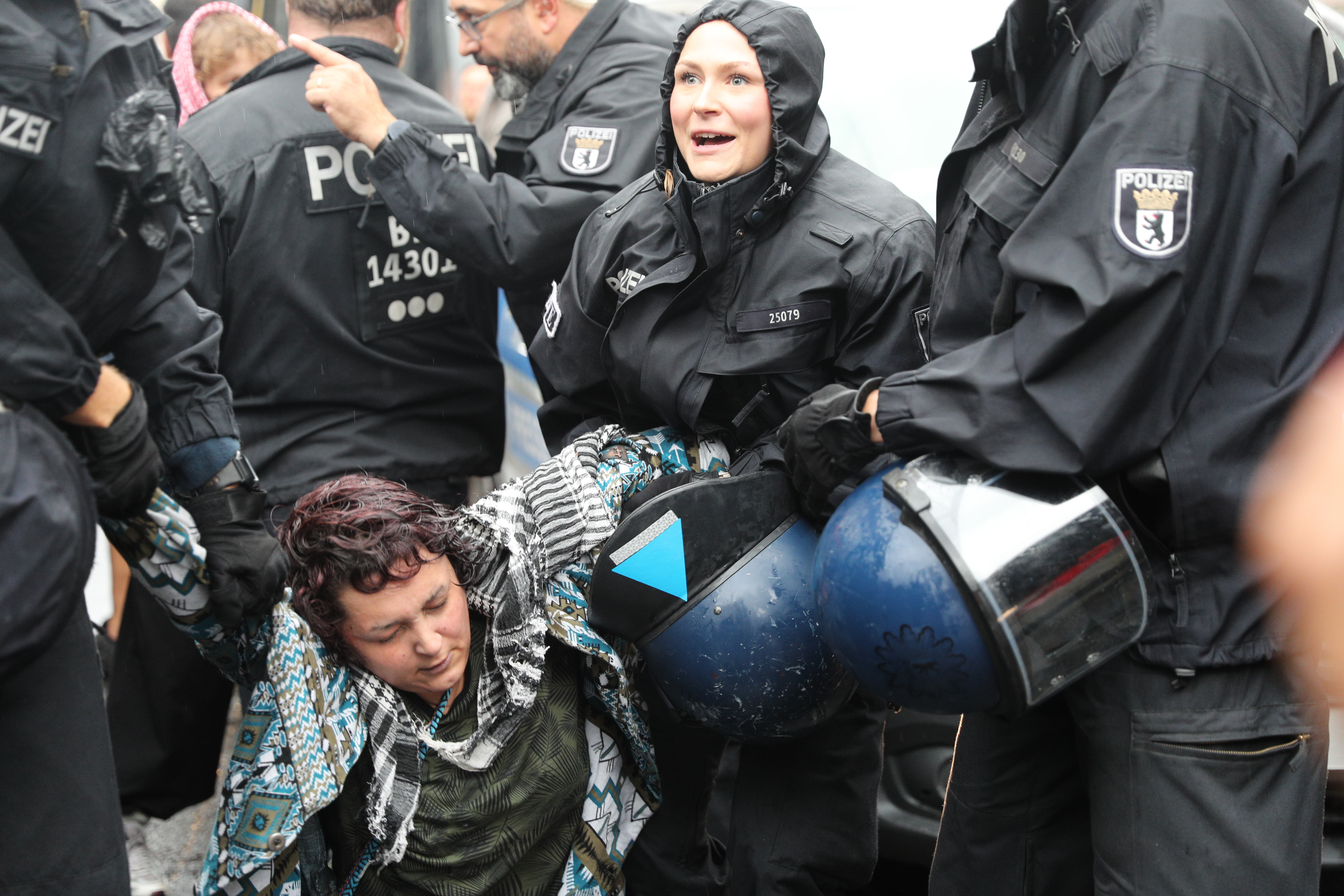 Clashes broke out during a pro-Palestinian demonstration at Hackescher Markt in Berlin, Germany on August 28, when police officers used force against Irish citizen Kitty O’Brien, pictured here falling to the ground