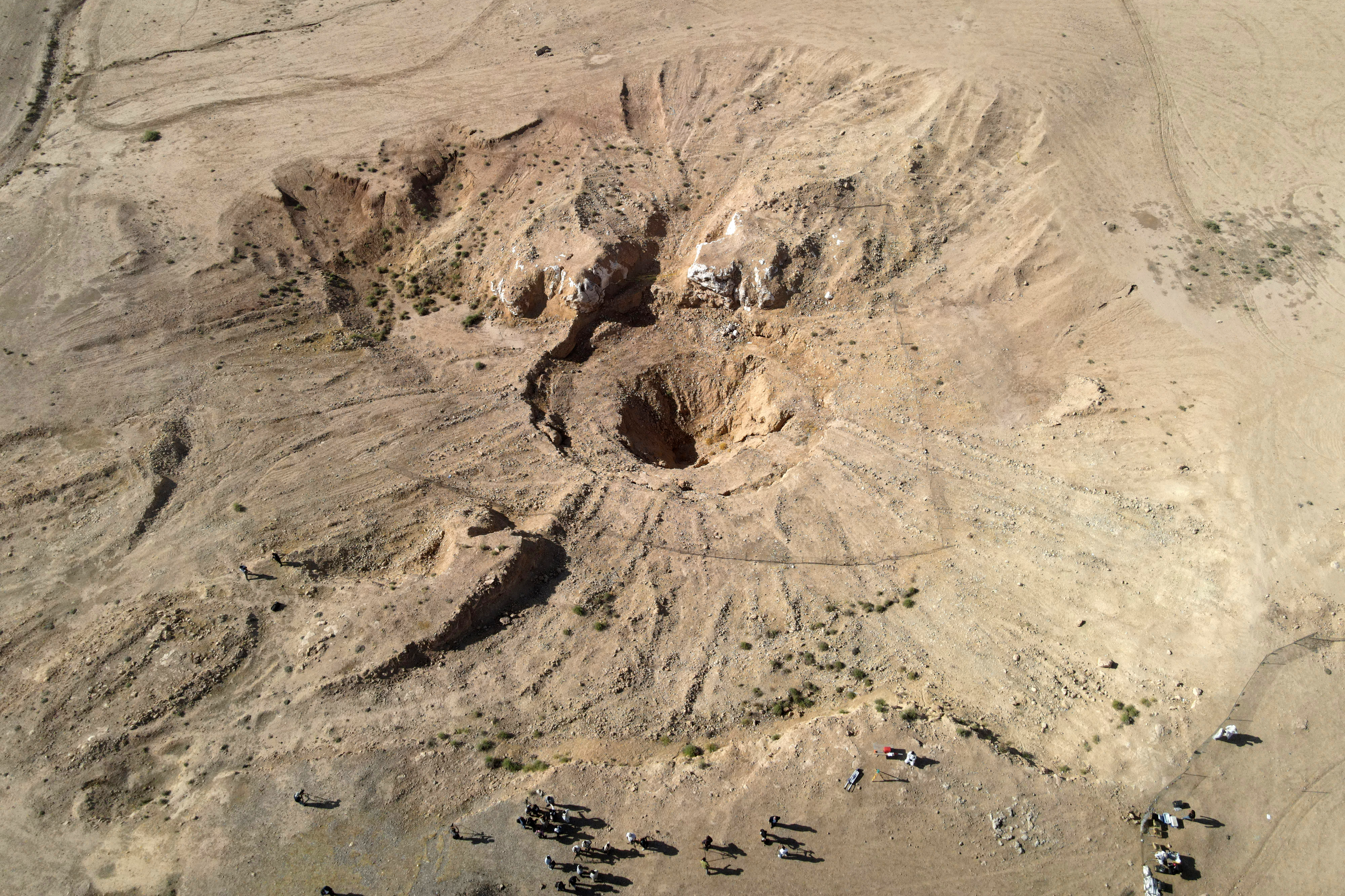 This aerial view shows a sinkhole at the Khasfa site near the northern Iraqi city of Mosul