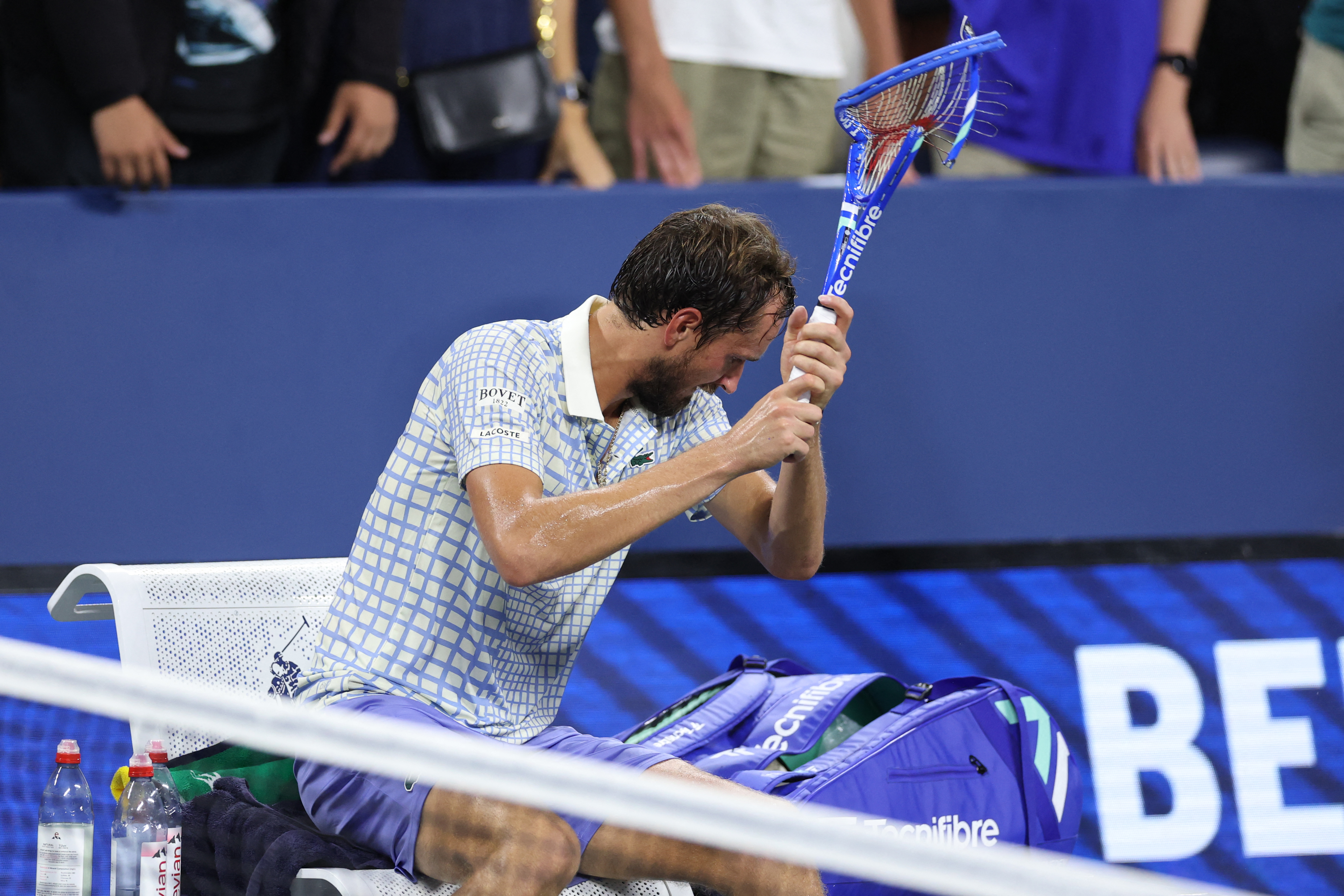Medvedev breaks his racket after losing his men’s singles first round tennis match against Bonzi