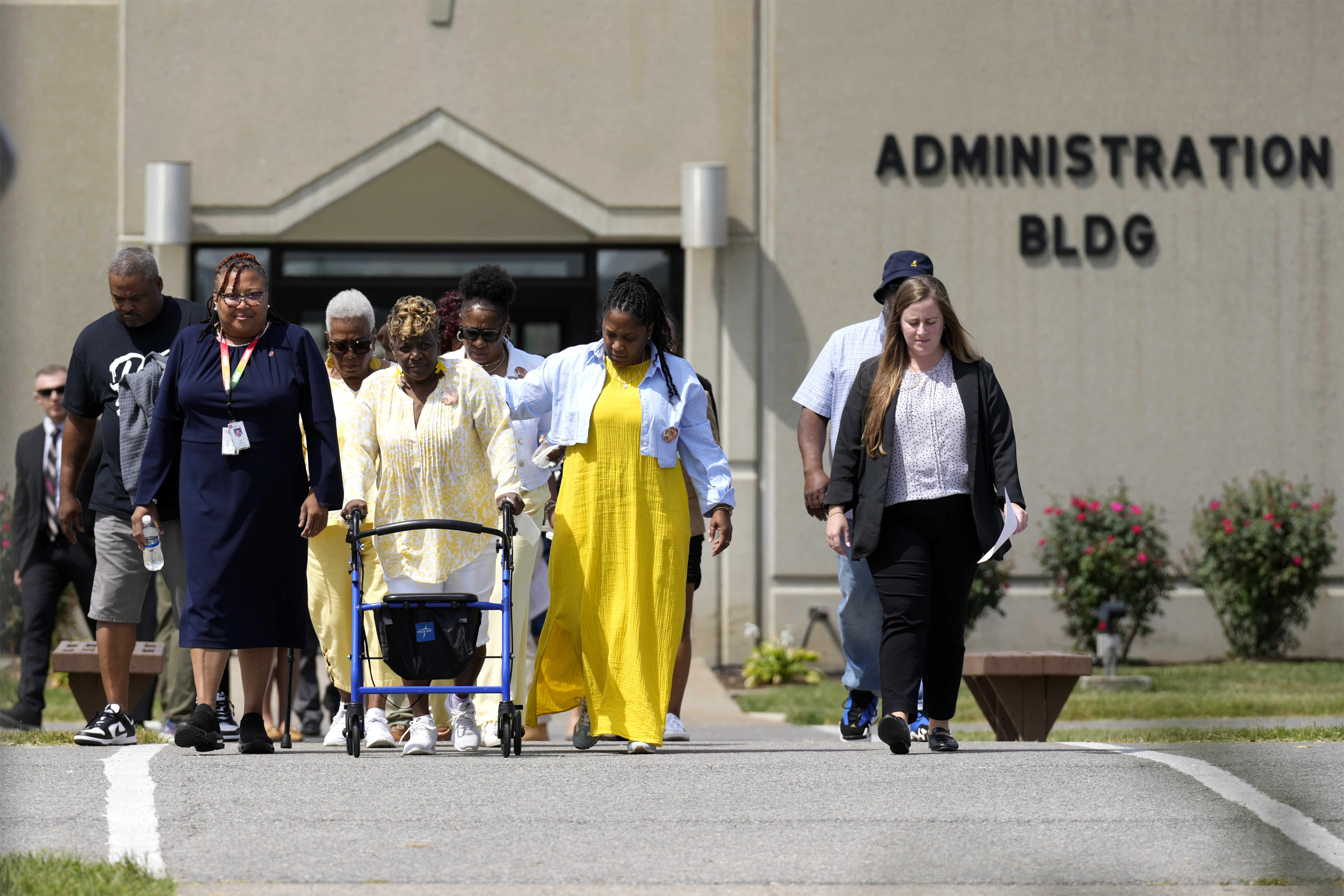 Relatives of the victims killed by convicted murderer Byron Black are escorted from the Riverbend Maximum Security Institution in Nashville, Tennessee
