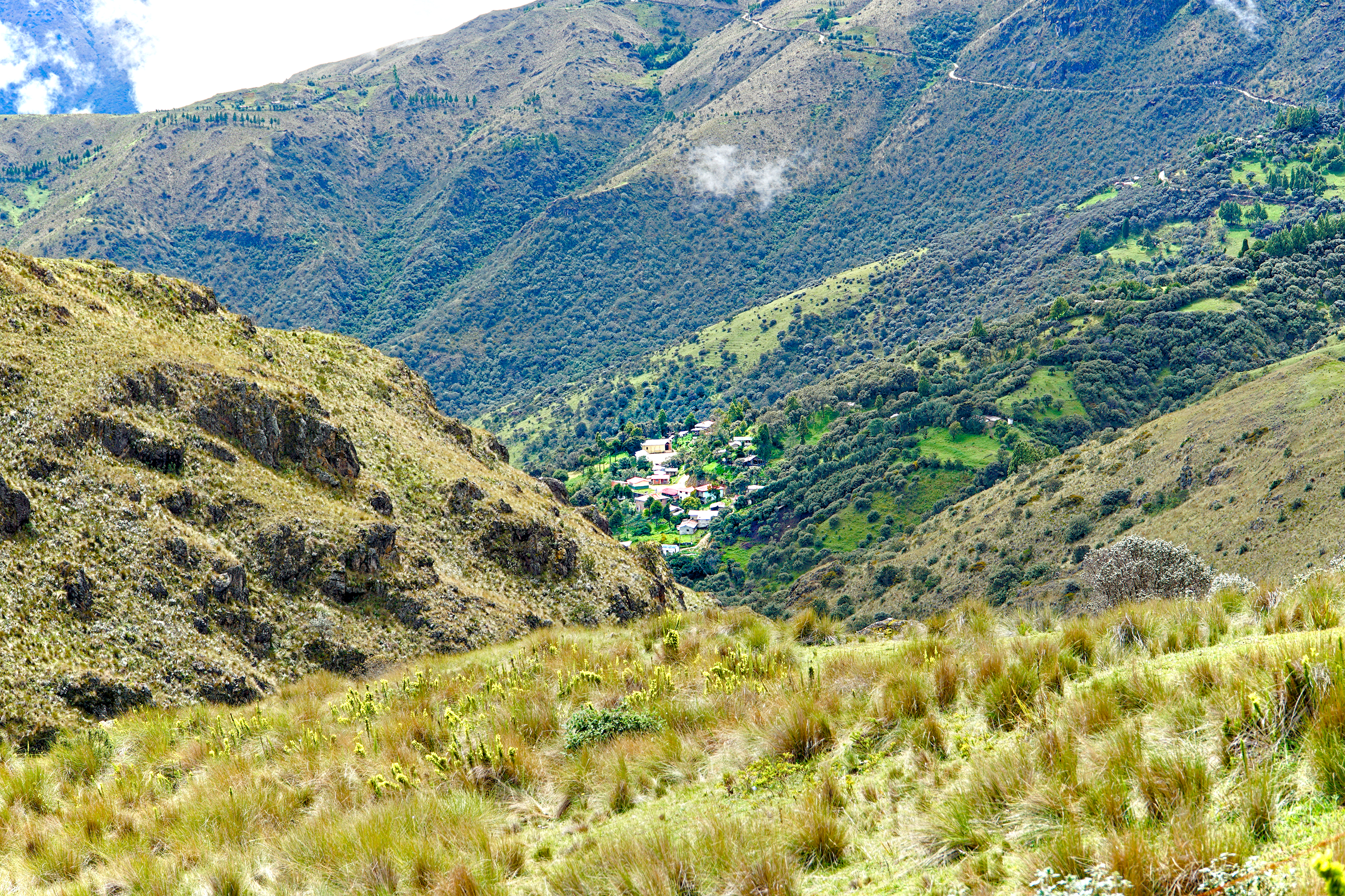 A view of the Rio Blanco settlement in Ecuador from between the mountains