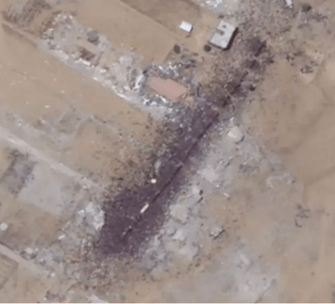 Satellite image from July 26, 2025, showing crowds of Palestinians and aid trucks in Khan Younis [Planet Labs PBC]
