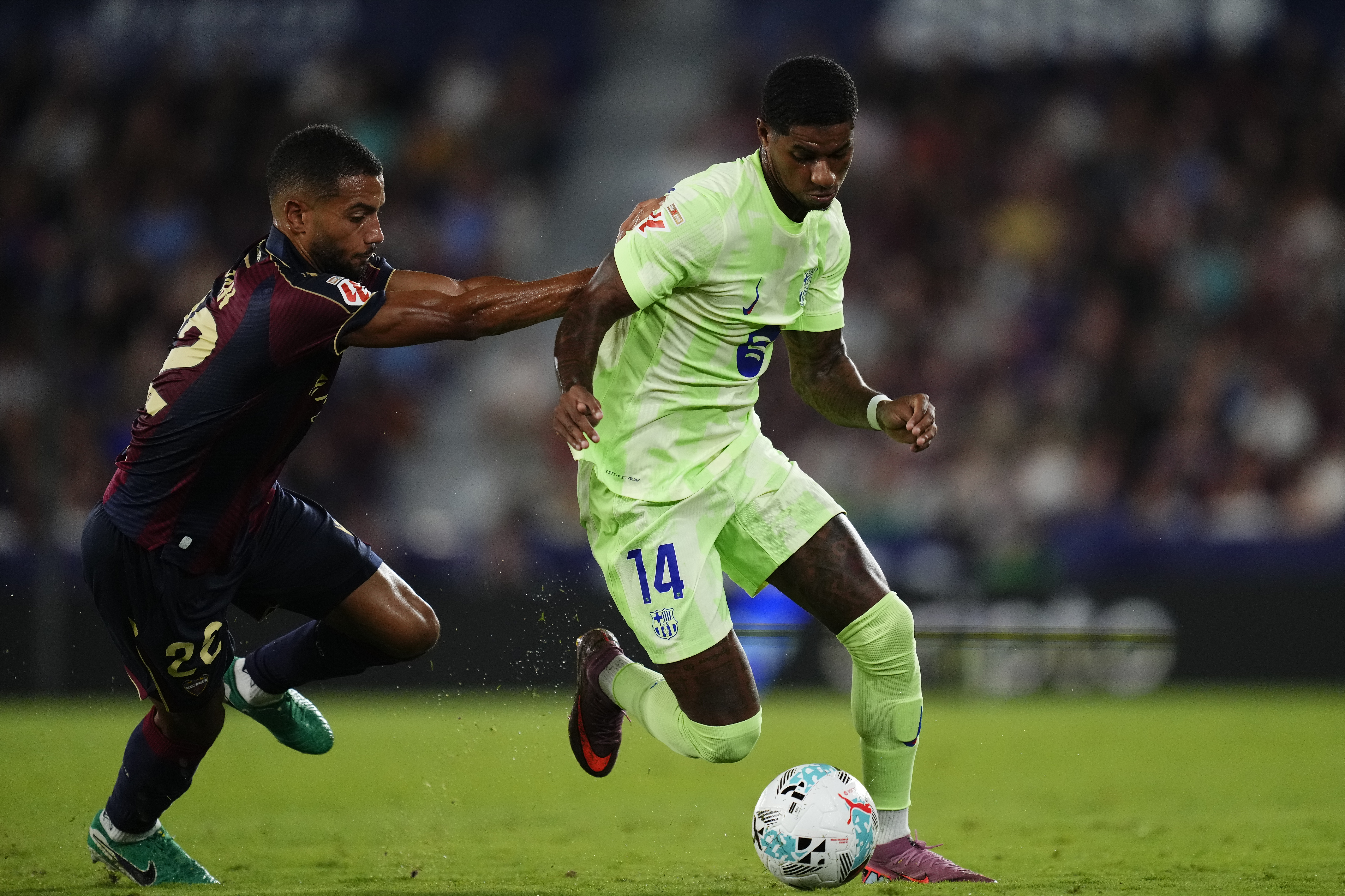 Marcus Rashford, right, on loan from Premier League club Manchester United, made his debut for Barcelona against Levante on Saturday
