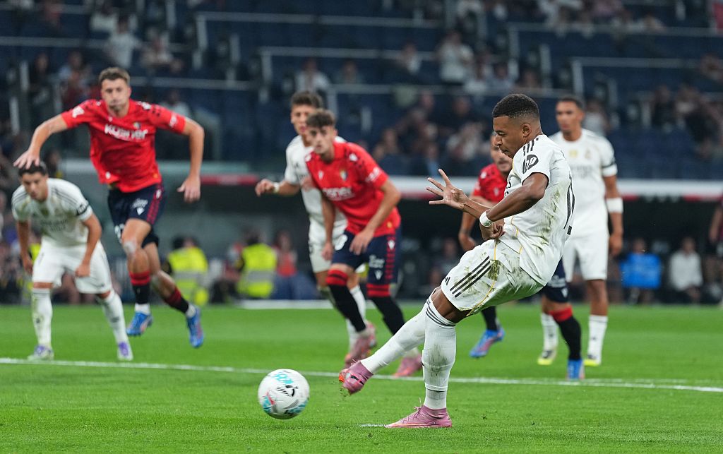 Kylian Mbappe of Real Madrid scores his team’s winning goal
