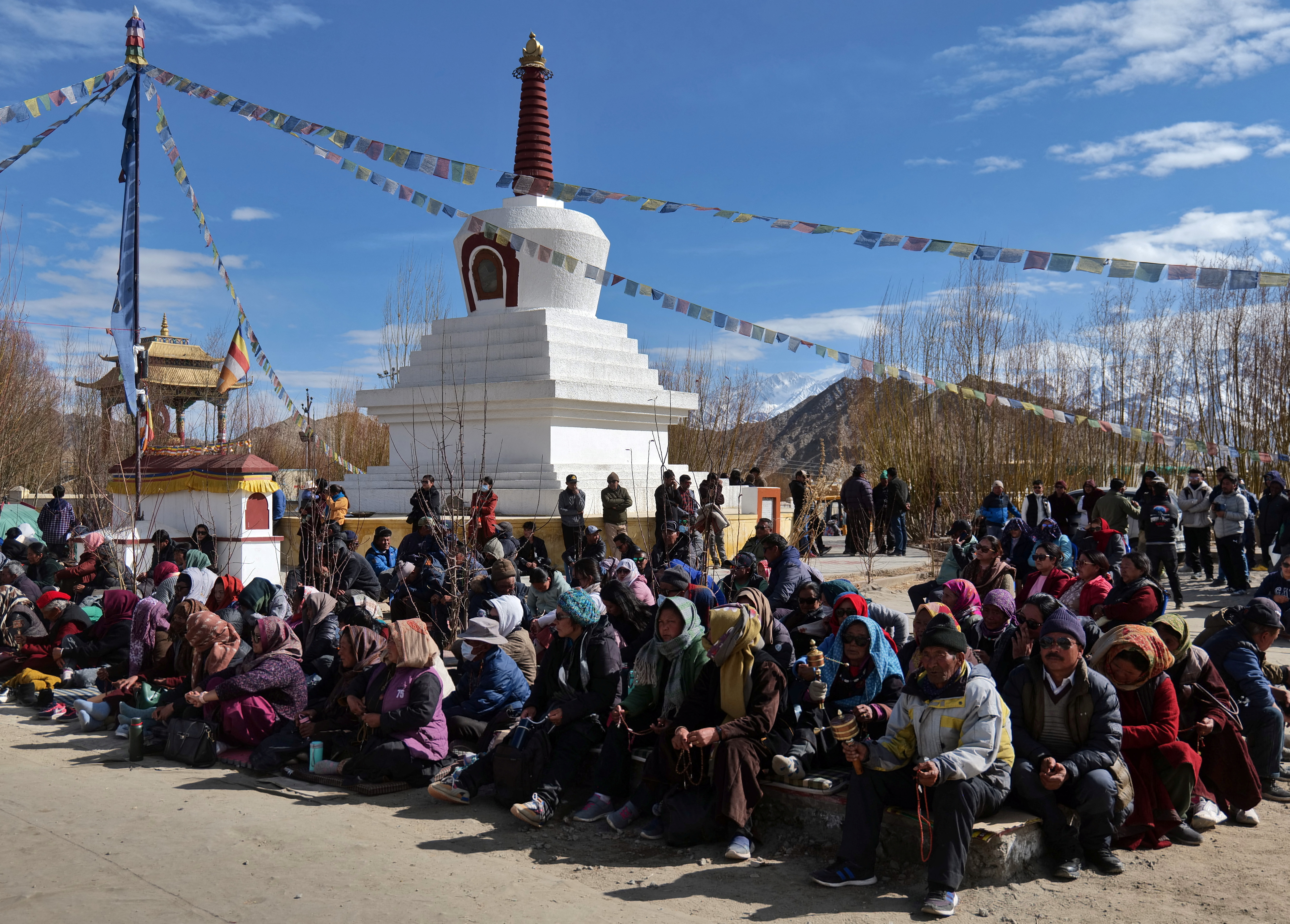 Demonstrators attend a sit-in demanding constitutional safeguards and statehood for the Himalayan region of Ladakh on March 21, 2024 [Reuters]