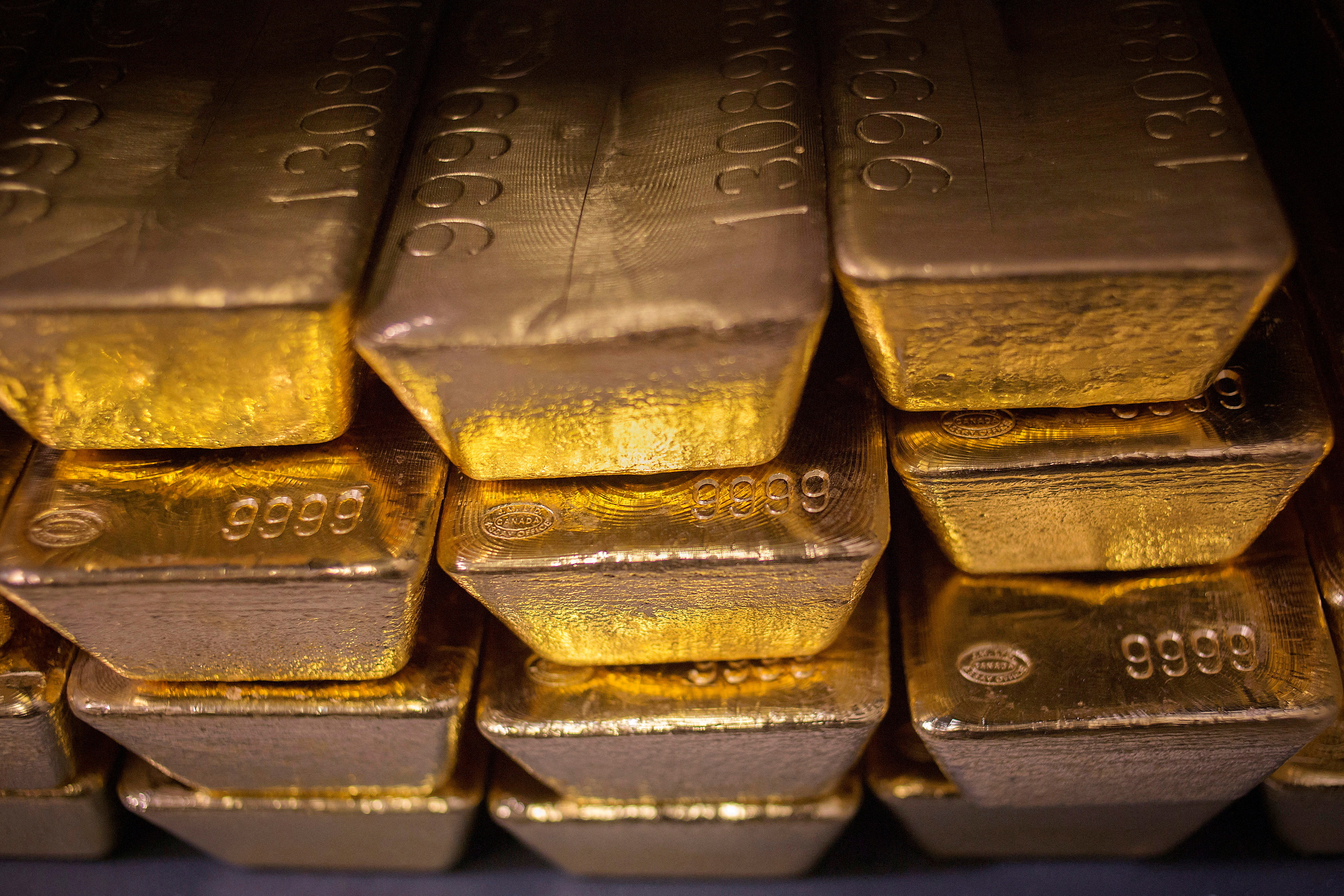 A stack of gold bars is seen.