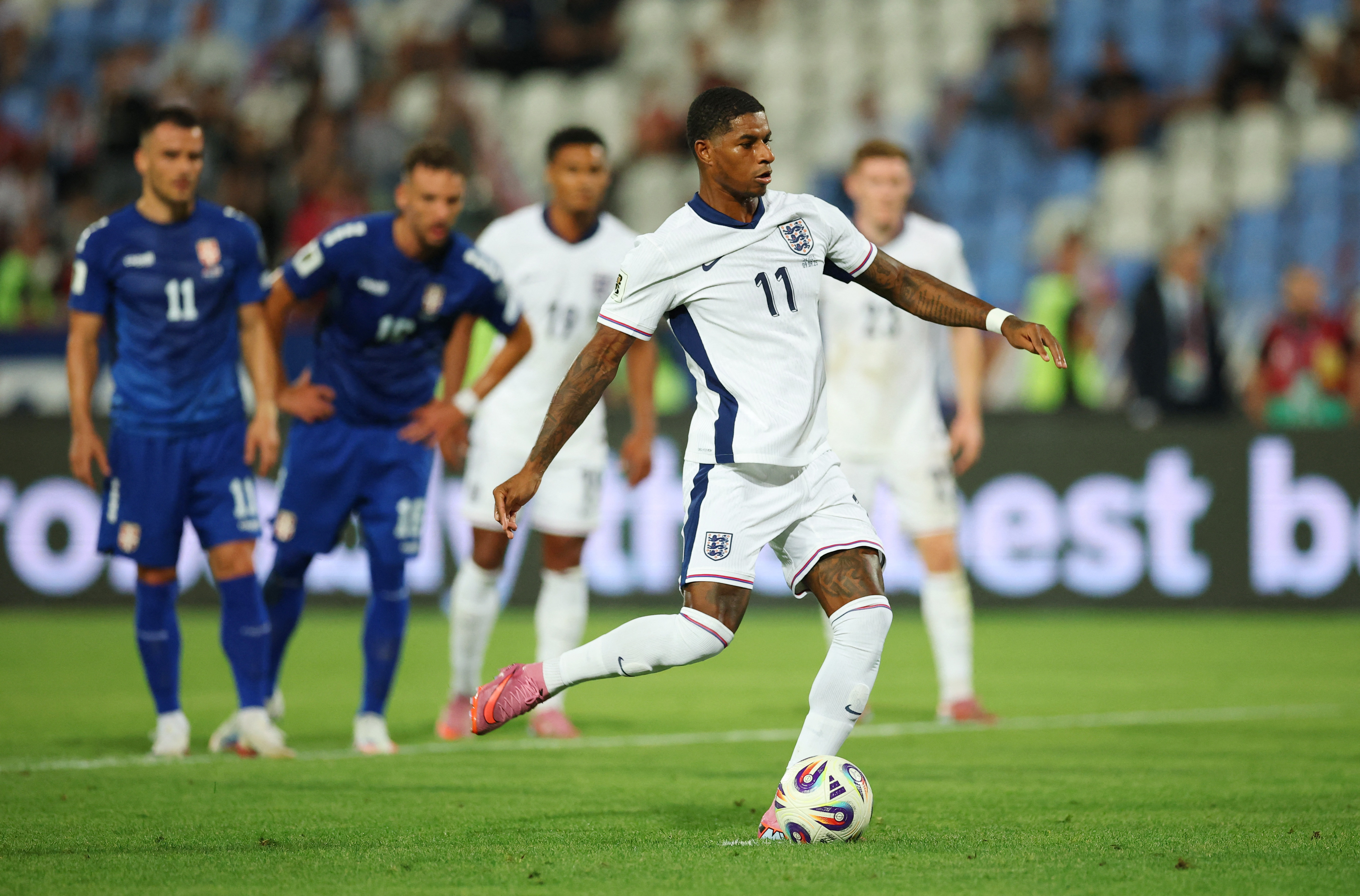 England’s Marcus Rashford scores their fifth goal from the penalty spot against Serbia on September 9