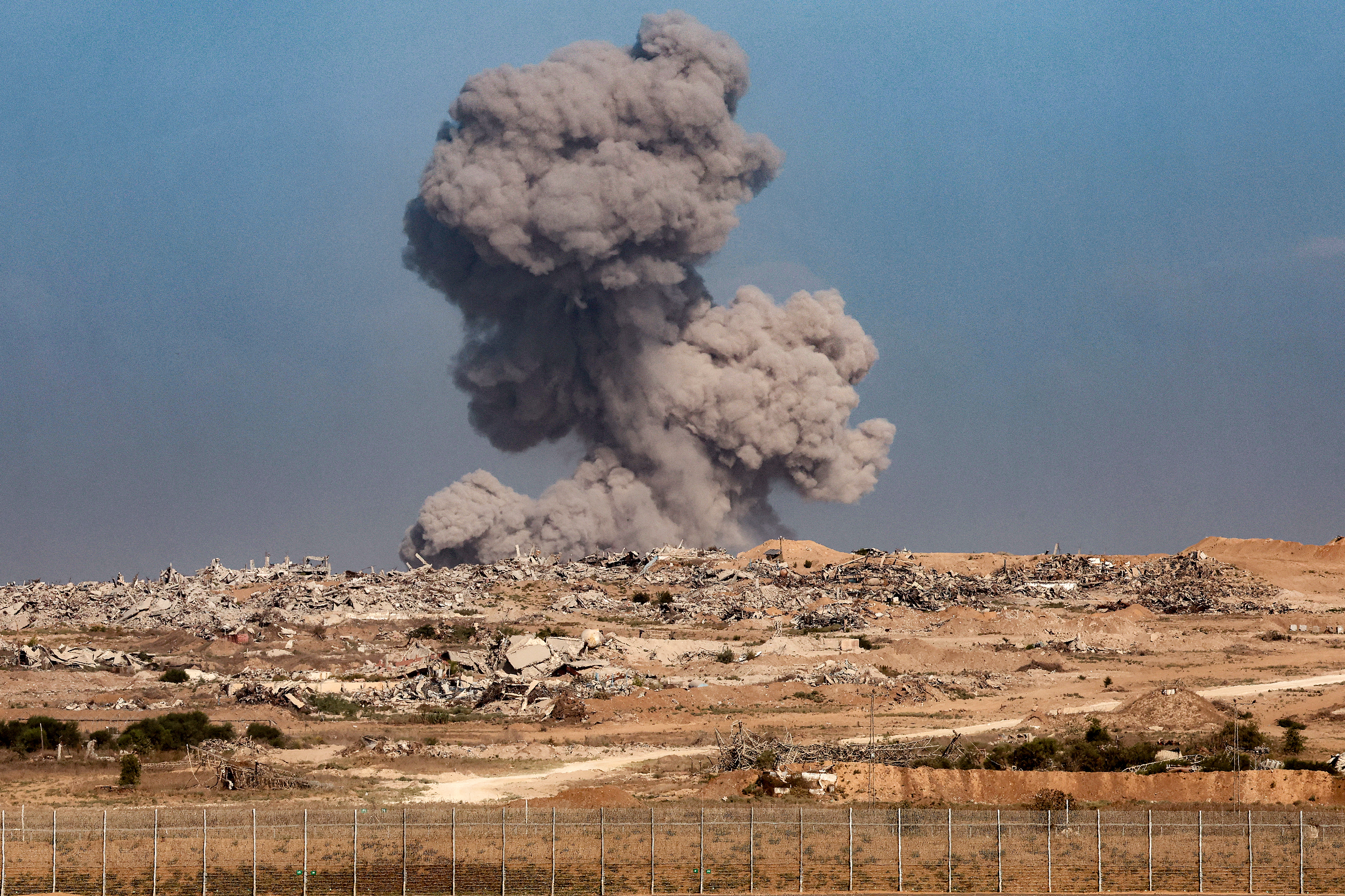 A smoke plume billows following Israeli bombardment on the Gaza Strip
