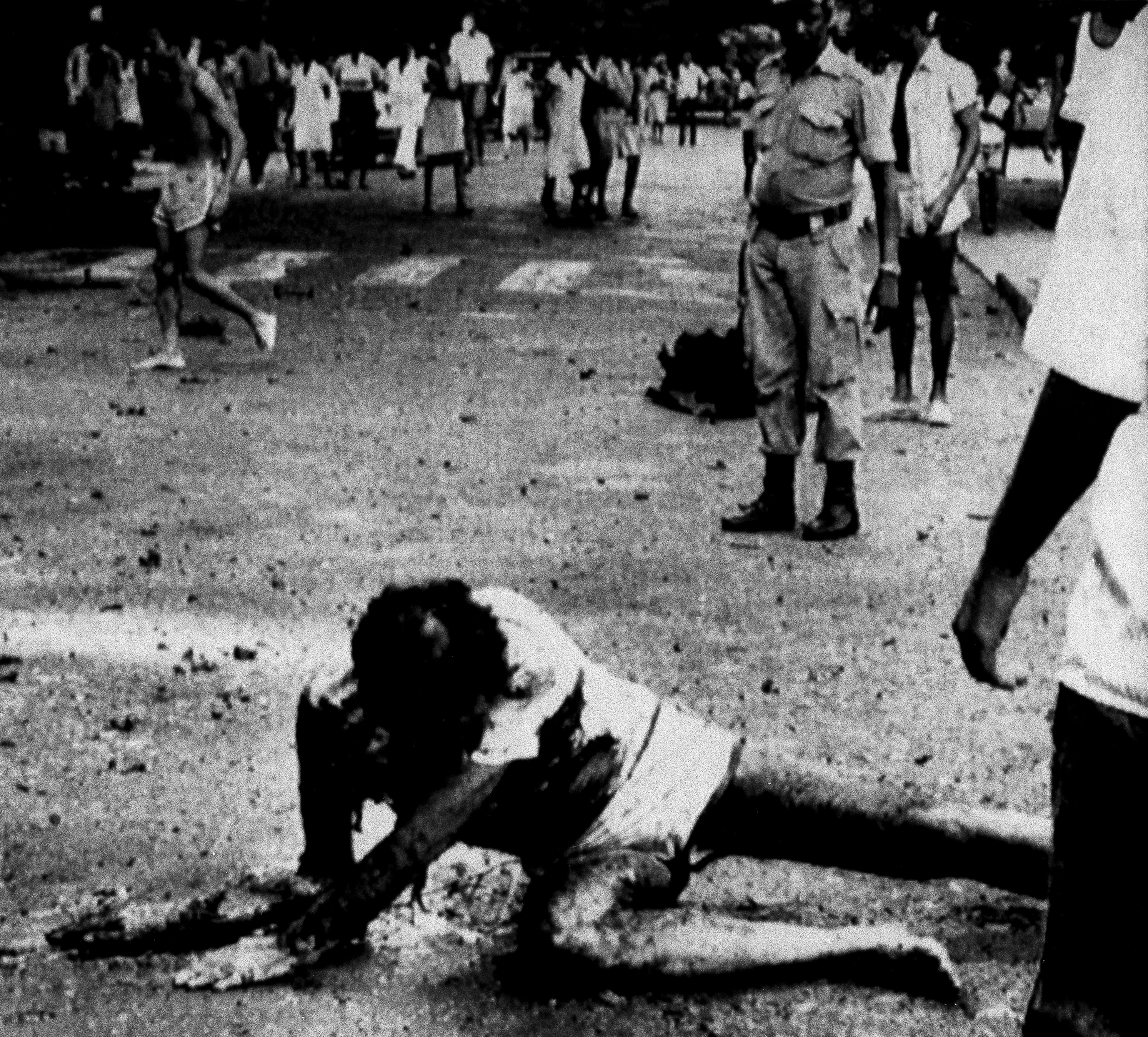 Gravely wounded Albie Sachs, a prominent South African attorney and anti-apartheid activist living in Mozambique, tried to lift himself from the pavement in Maputo, on April 7, 1988, after he was injured in an explosion by South Africa’s apartheid regime