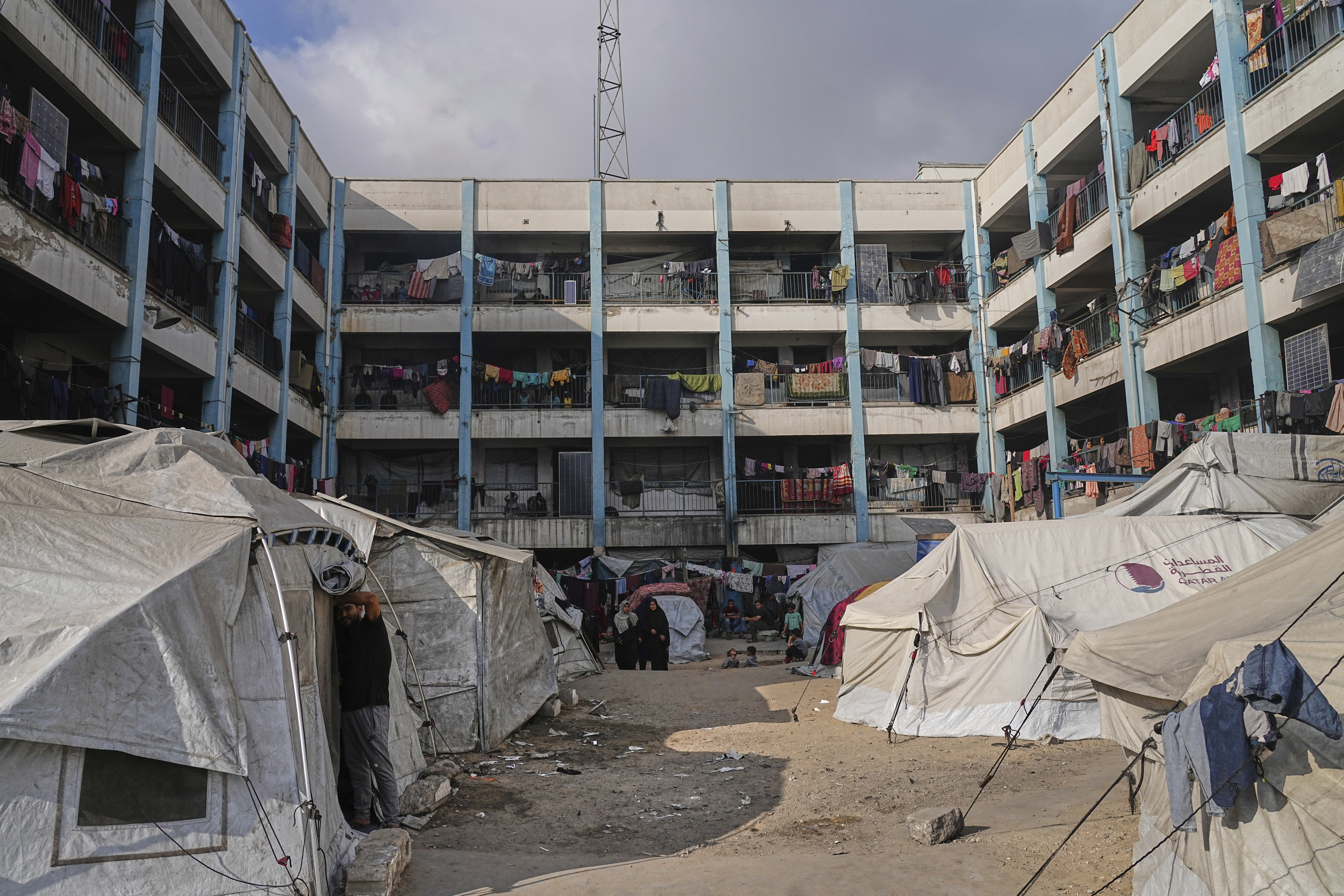 Tents sit in the courtyard of a school run by UNRWA