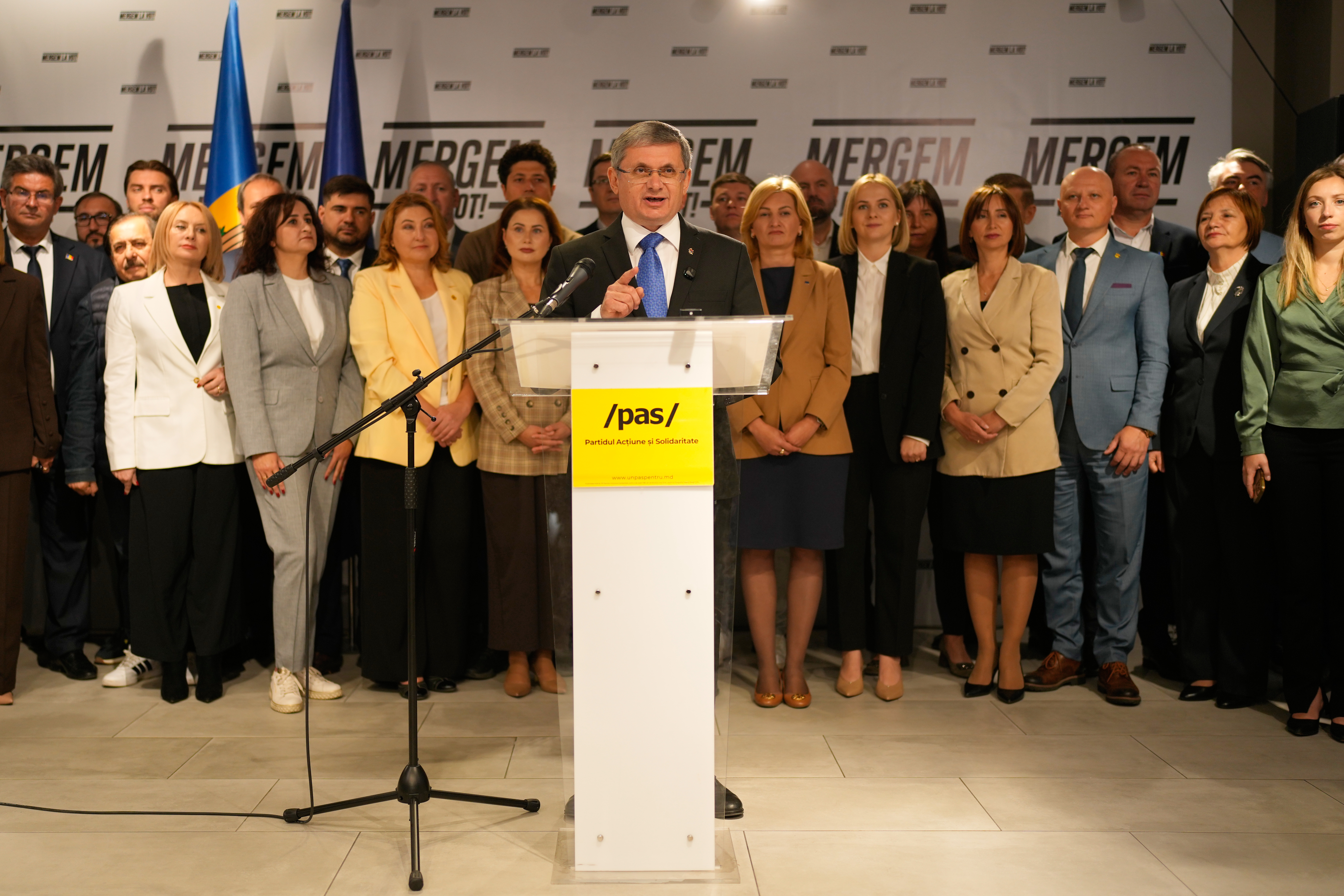 PAS leader Grosu speaks at a press conference 