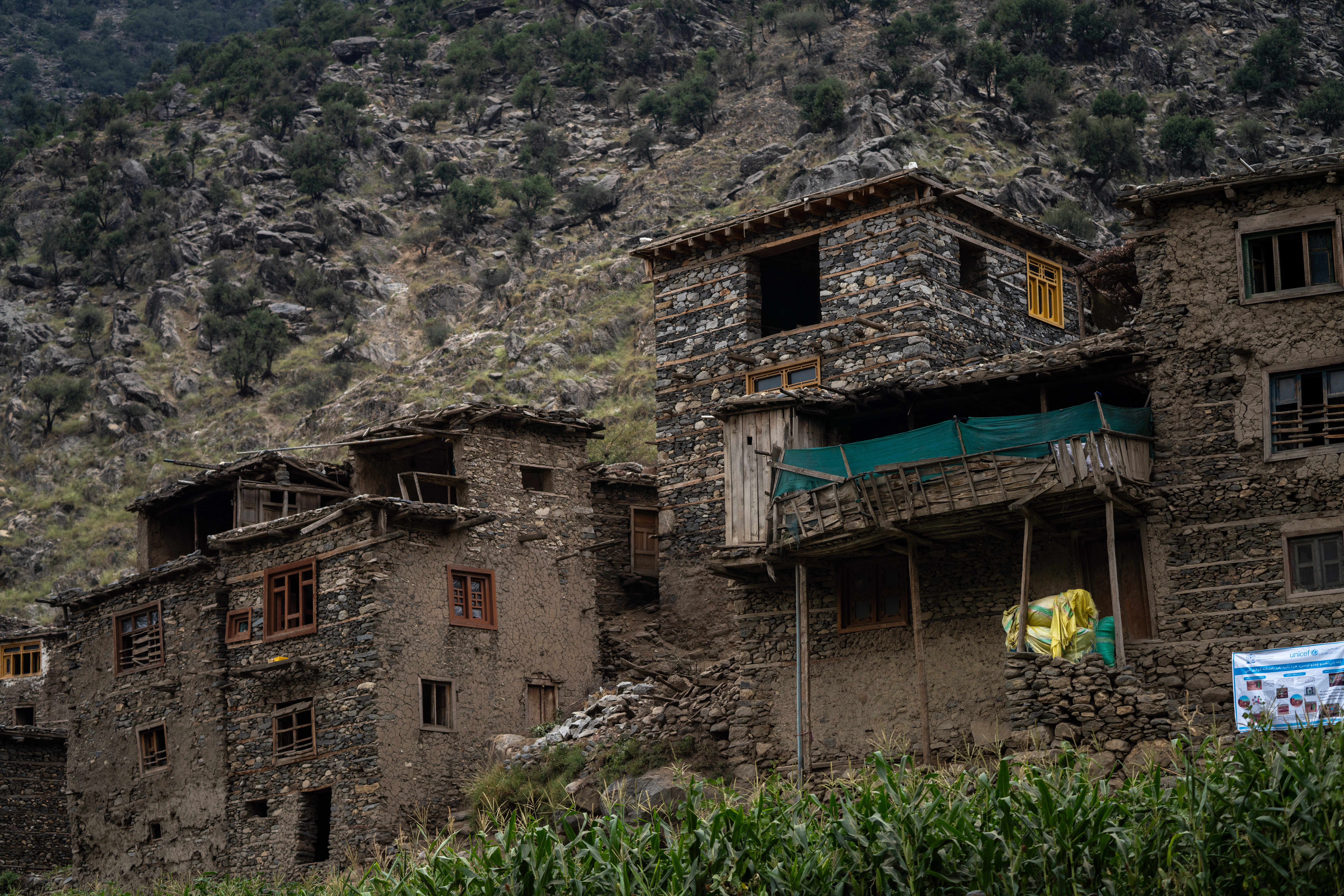Many of the houses in Andarlachak village are still standing, but authorities have called on people to move to the camps as aftershocks may cause further collapses.