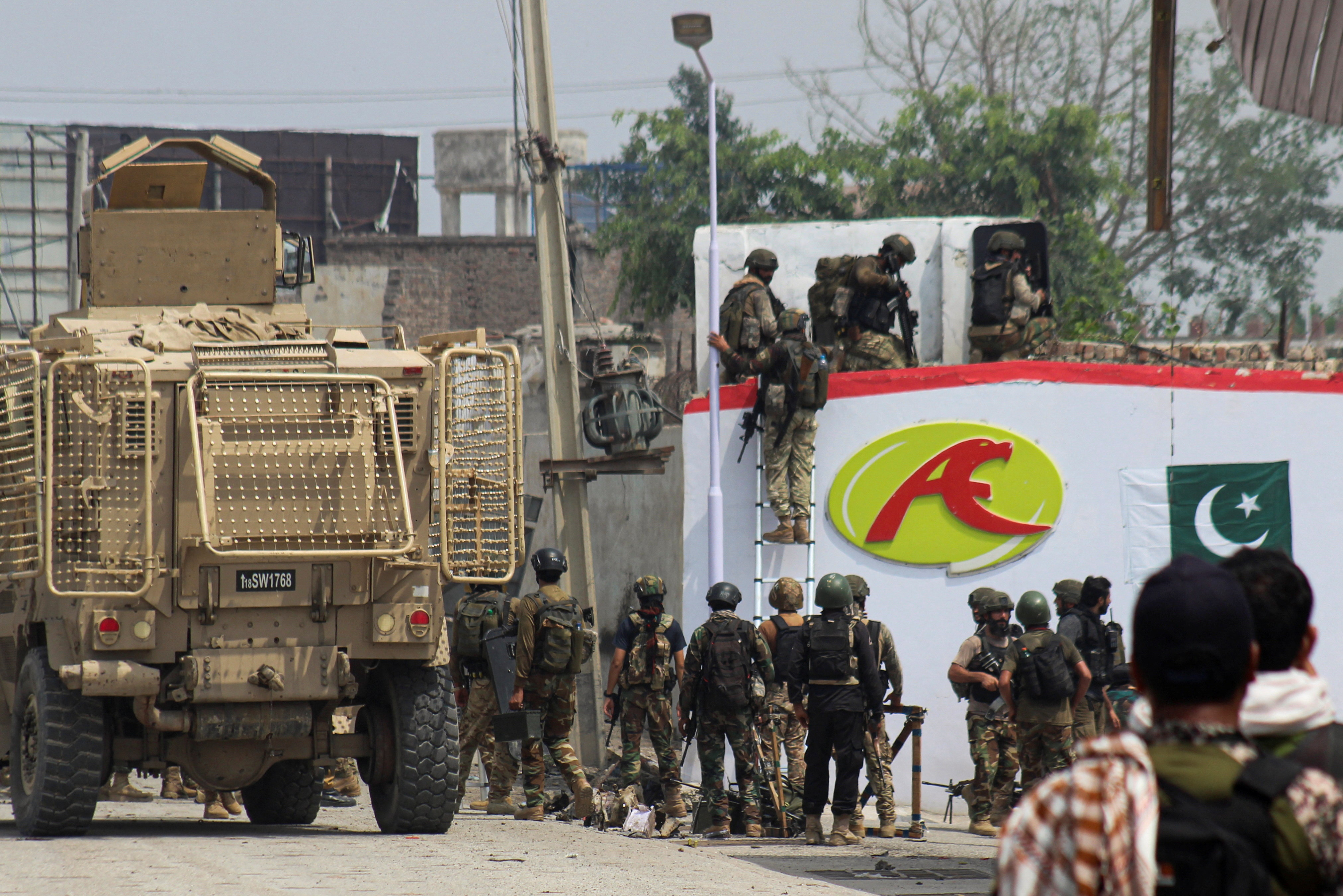 Pakistani soldiers secure the area following an attack by armed groups on the Frontier Constabulary (FC) headquarters in Bannu, Khyber Pakhtunkhwa province, in Pakistan, on September 2, 2025