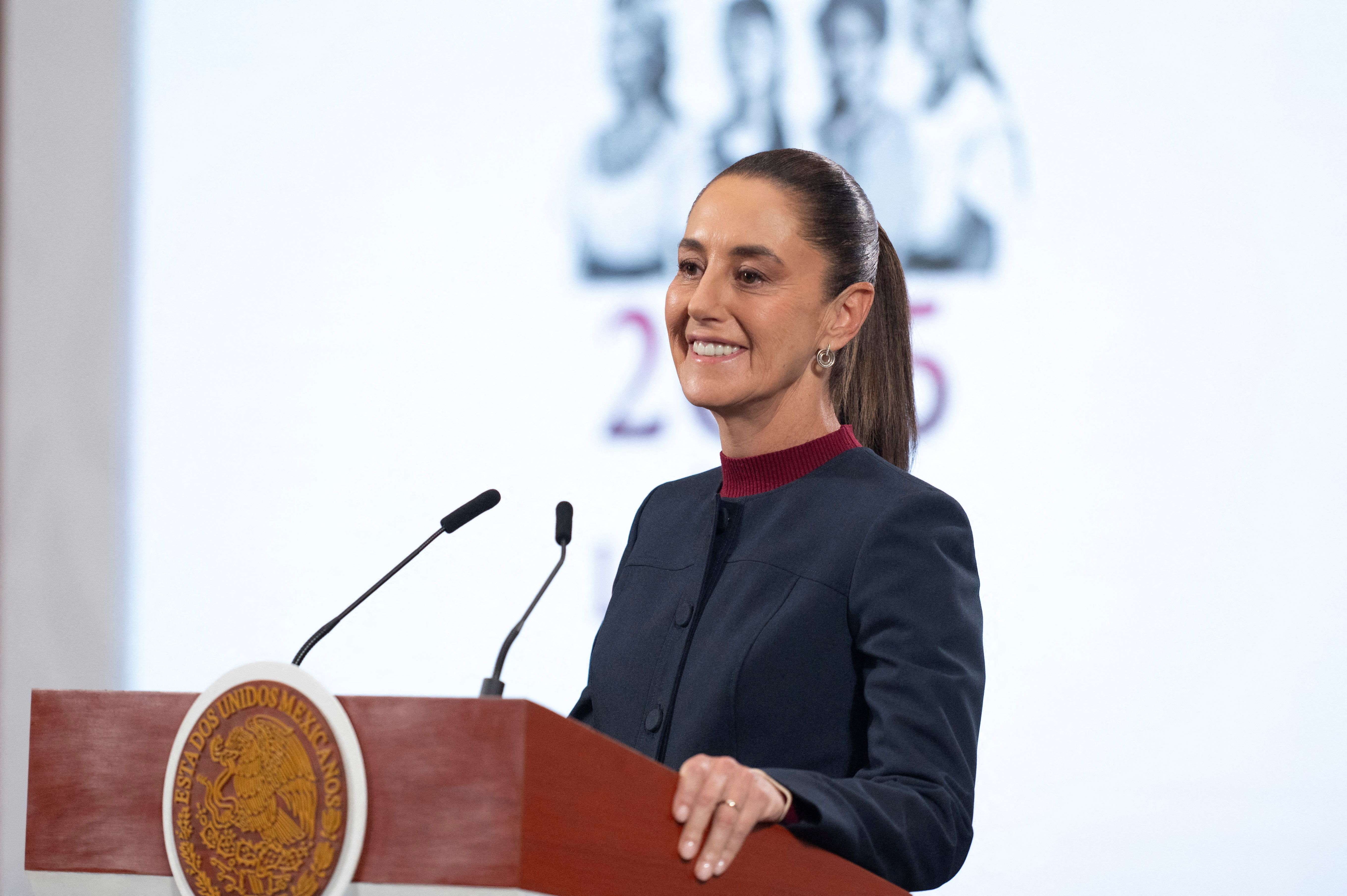 Claudia Sheinbaum at the podium during her morning news conference.