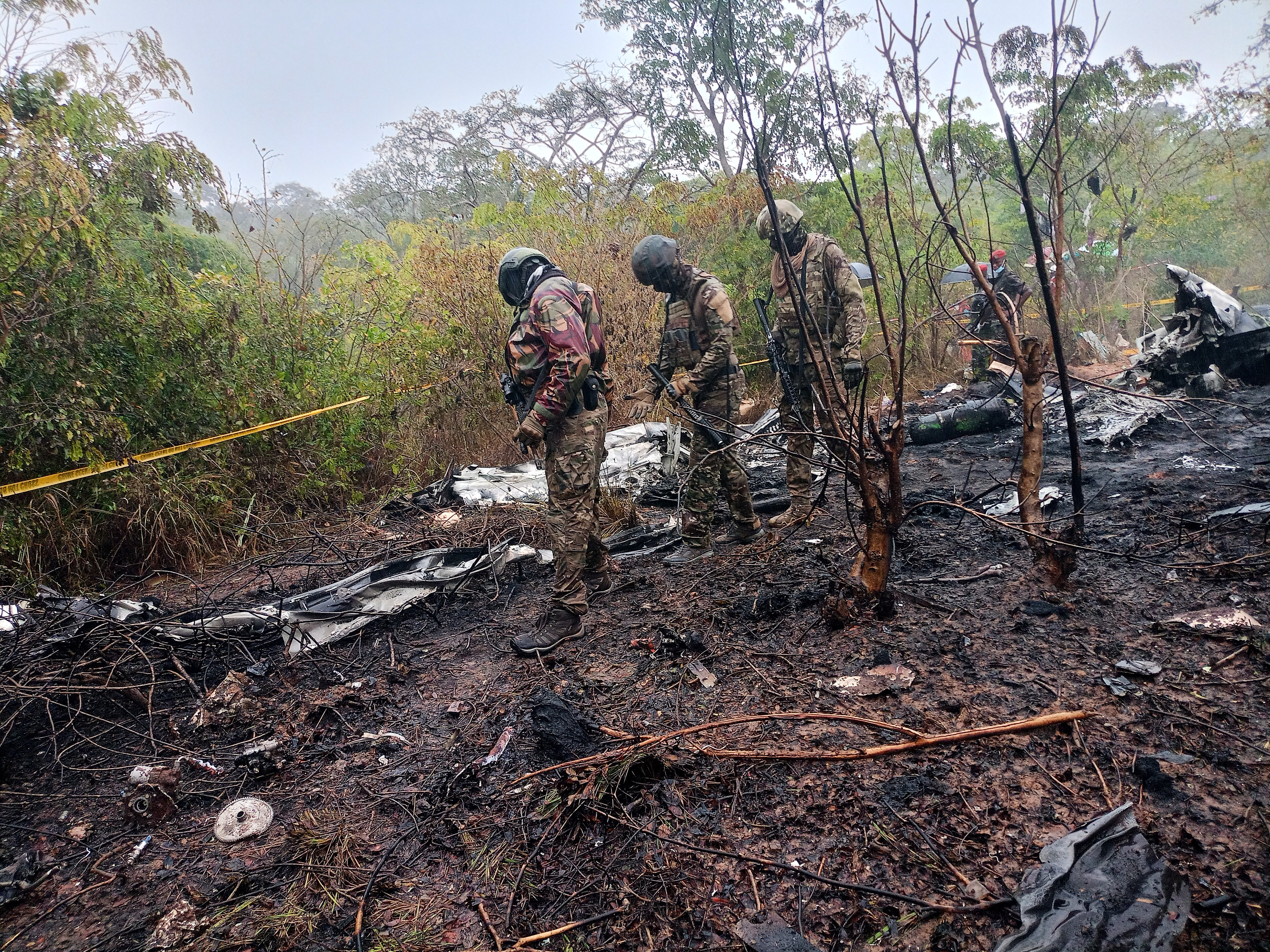 Kenyan officials inspect the scene of a plane crash near Diani, Kenya, Tuesday, October 28, 2025 [AP]