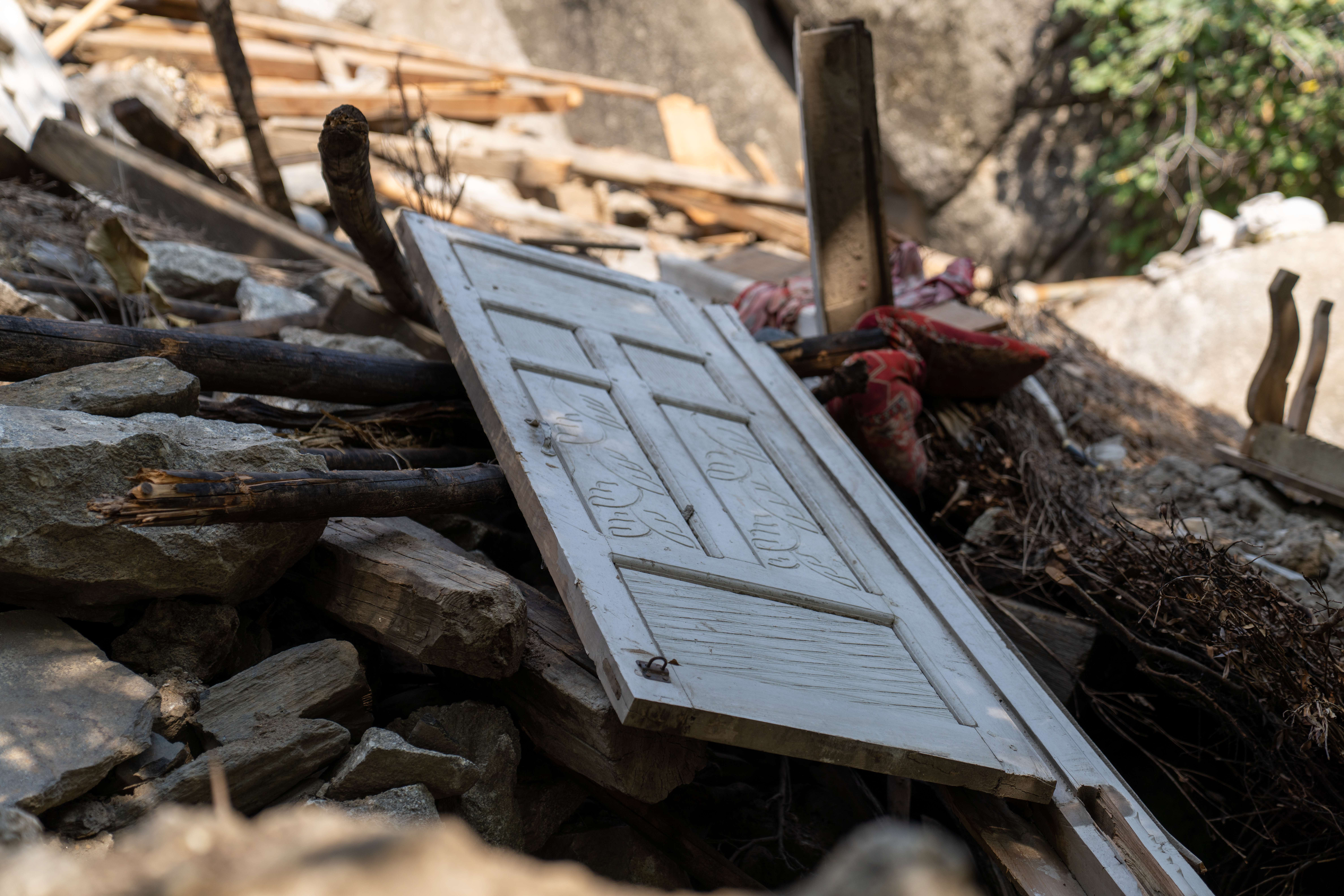 Destroyed homes in Aurak Dandila village [Sorin Furcoi/Al Jazeera]