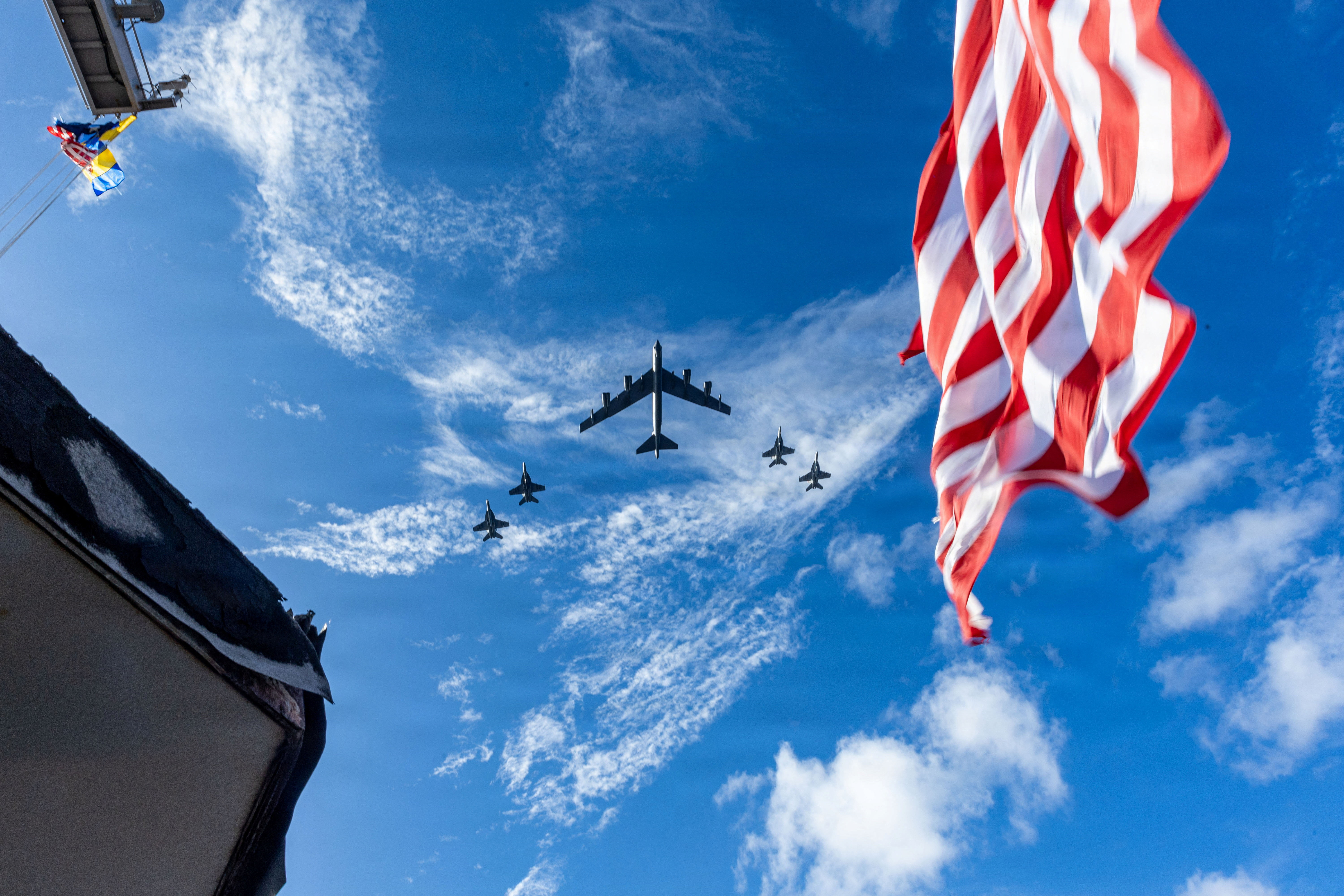 F/A-18E/F Super Hornets and a U.S. Air Force B-52 Stratofortress fly over the U.S. Navy’s Gerald R. Ford Carrier Strike Group in the Atlantic Ocean November 13, 2025. U.S. Navy/Seaman Zamirah Connor/Handout via REUTERS. THIS IMAGE HAS BEEN SUPPLIED BY A THIRD PARTY.