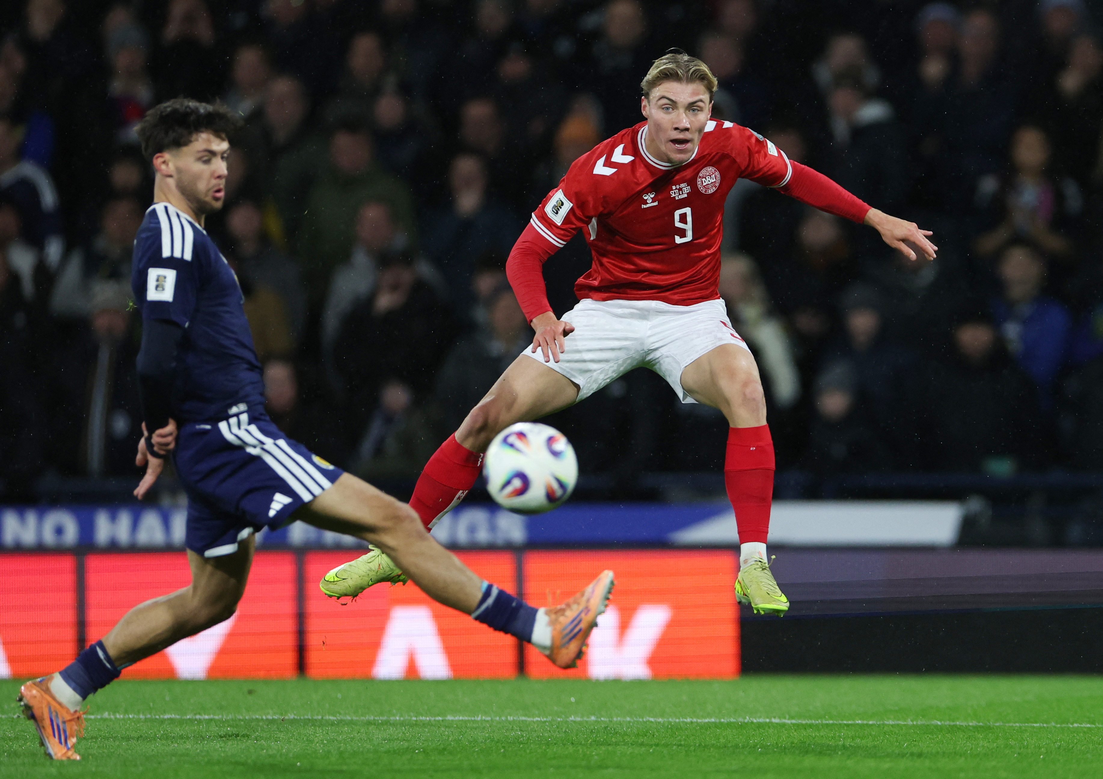 Soccer Football - FIFA World Cup - UEFA Qualifiers - Group C - Scotland v Denmark - Hampden Park, Glasgow, Scotland, Britain - November 18, 2025 Denmark's Rasmus Hojlund shoots at goal REUTERS/Russell Cheyne
