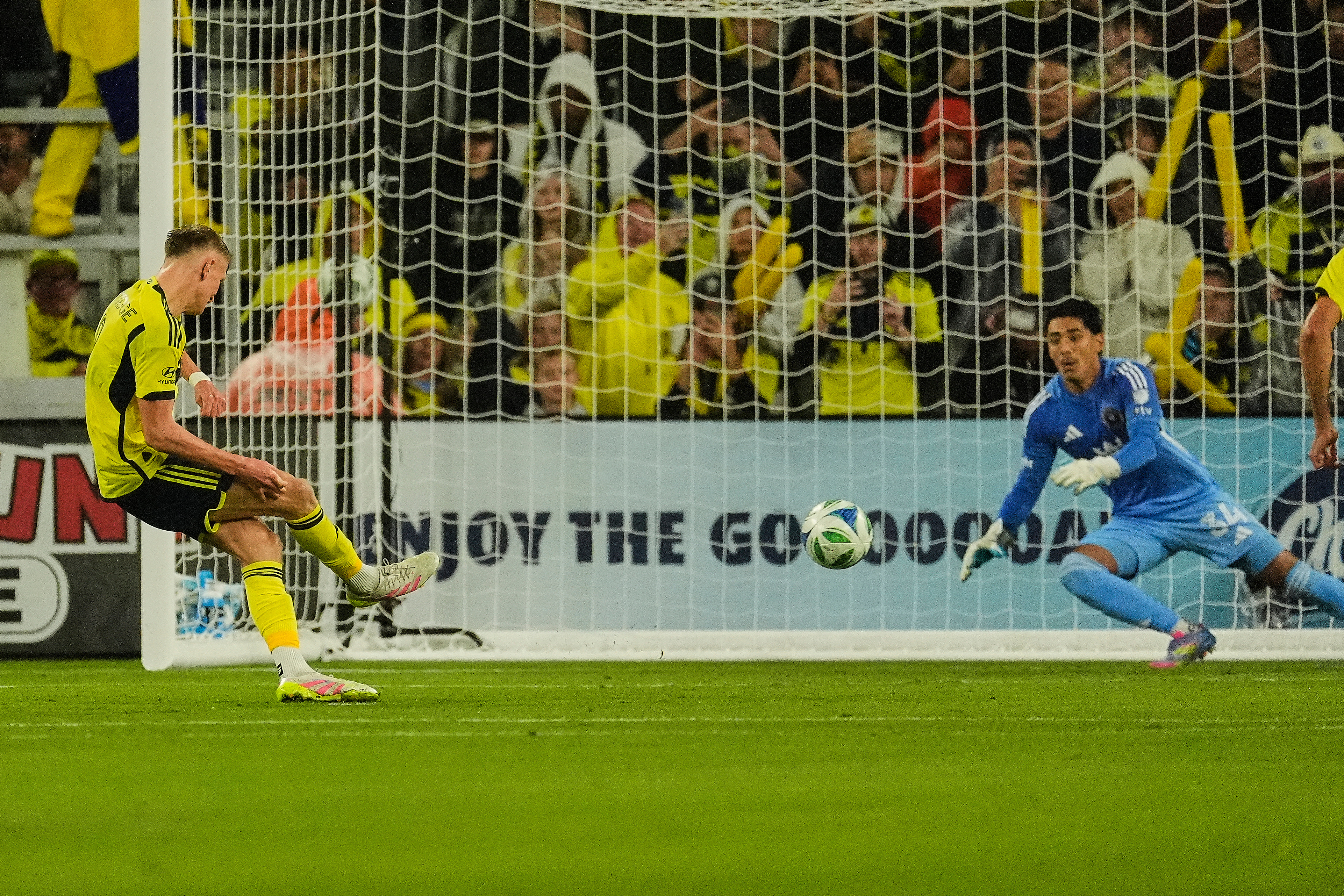 Nashville forward Sam Surridge, left, scores a goal on a penalty kick in the ninth minute of Game 2 against Inter Miami goalkeeper Rocco Rios Novo