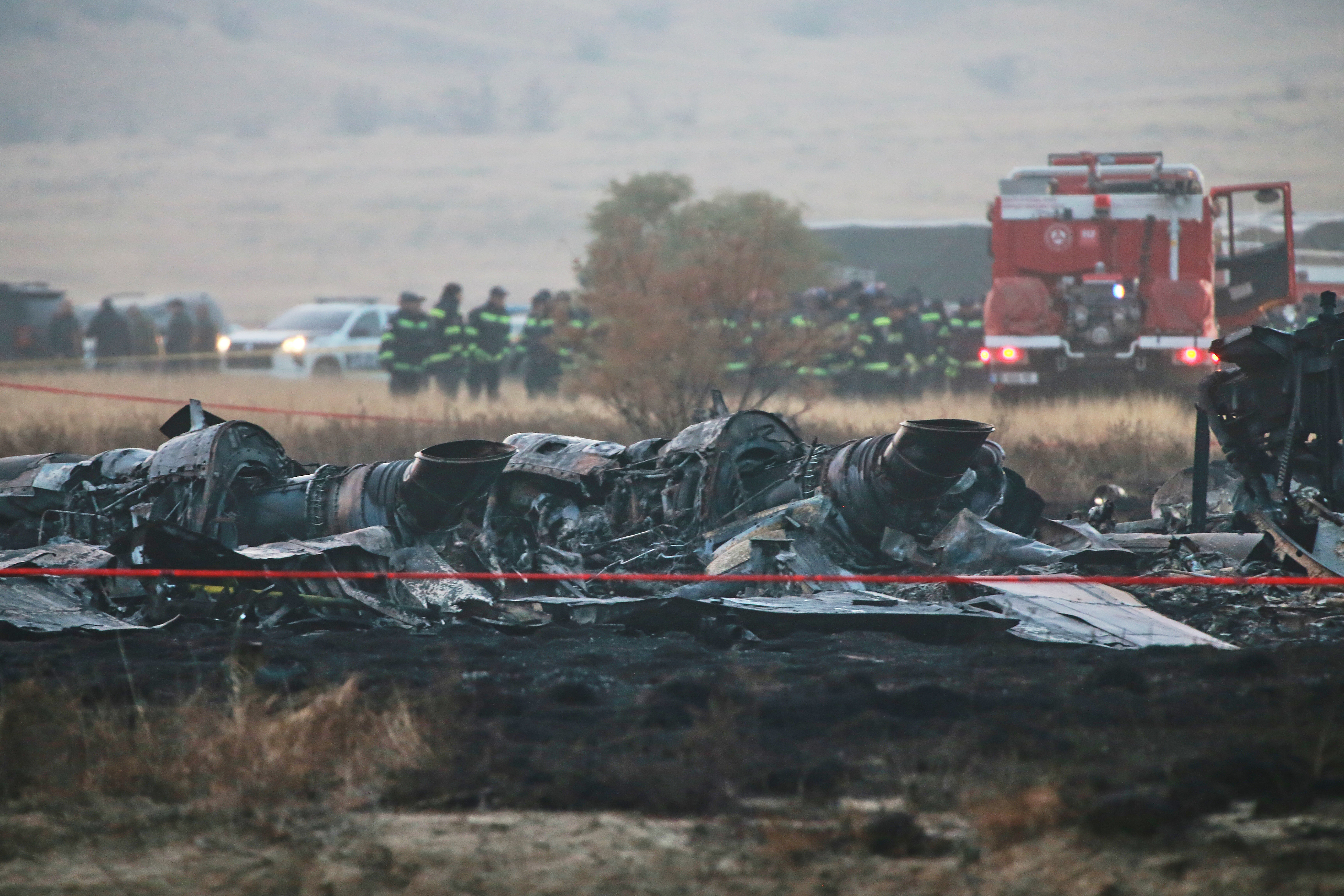Debris is seen at a crash site of a Turkish military cargo plane in Georgia's Sighnaghi municipality, close to the Azerbaijani border