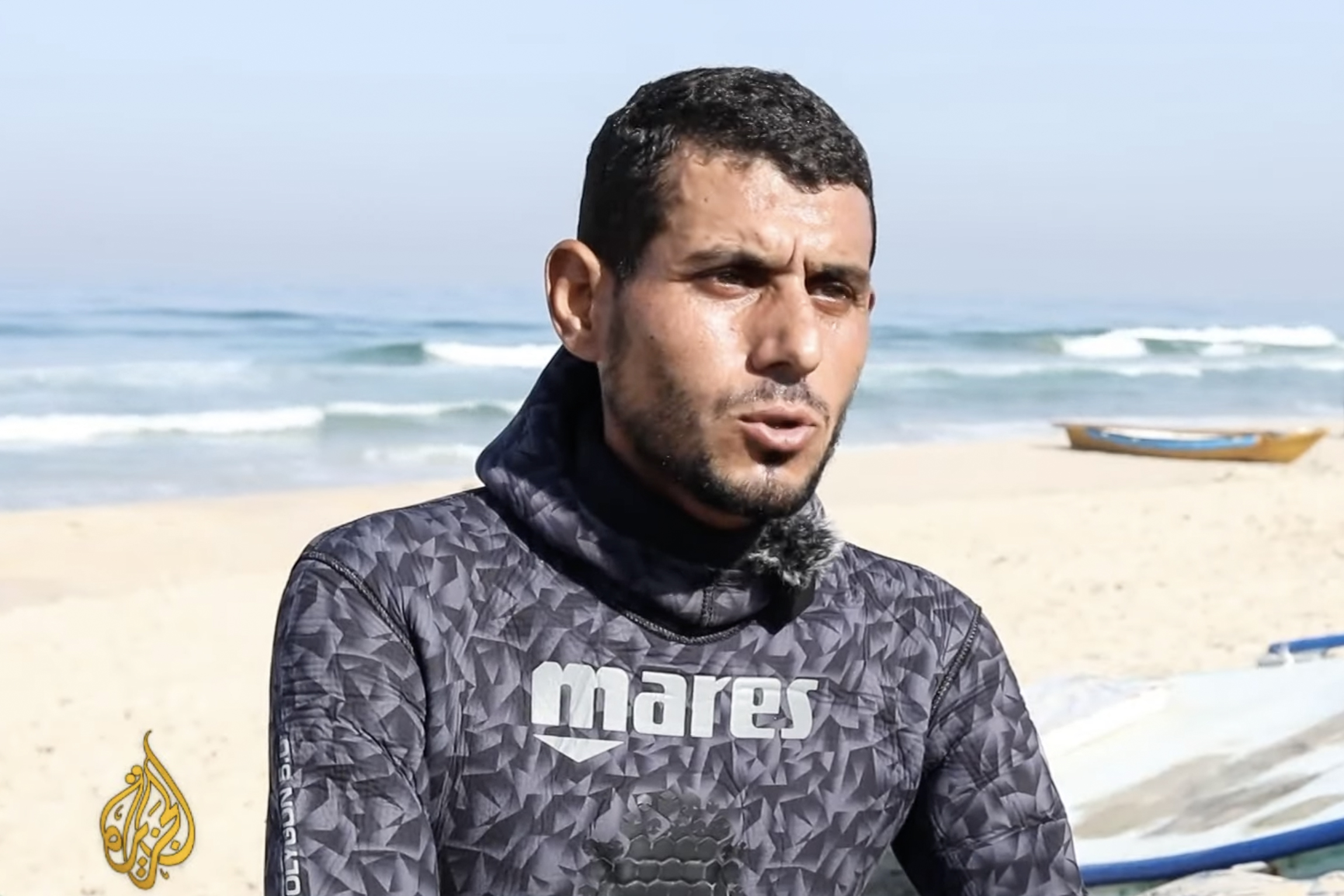 Salem Abu Amira, known to locals as ‘The Beast’, prepares to freedive off the coast of Gaza [Al Jazeera]