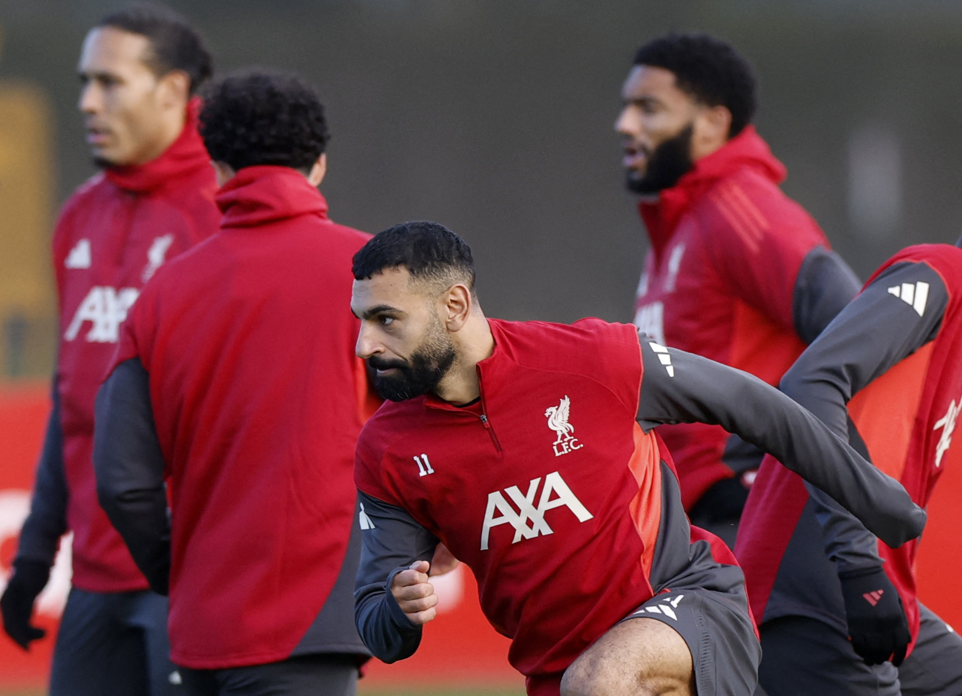 Mo Salah trains with his teammates in Liverpool on Monday before their trip to Milan