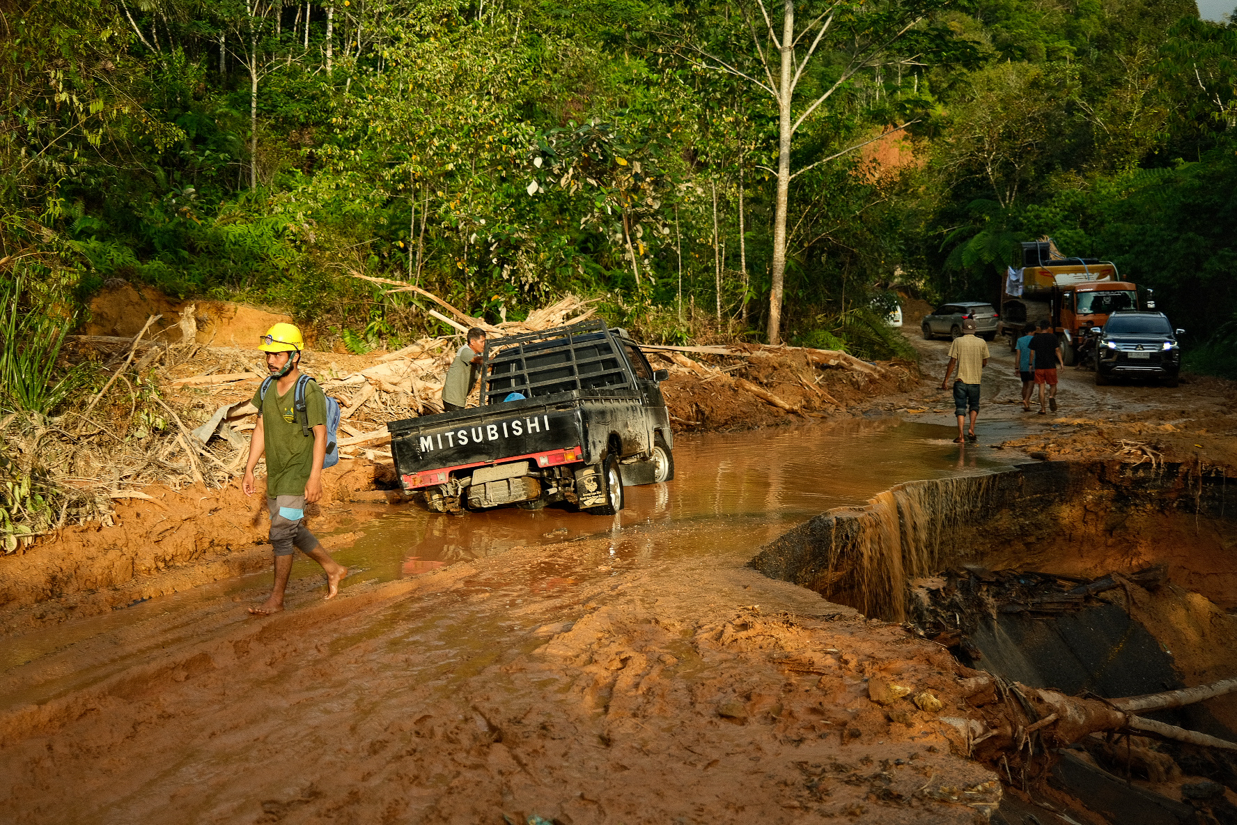 Indonesia’s disaster relief agency said teams are trying to speed up the distribution of aid. Many roads and bridges are damaged, making it difficult to reach some communities.